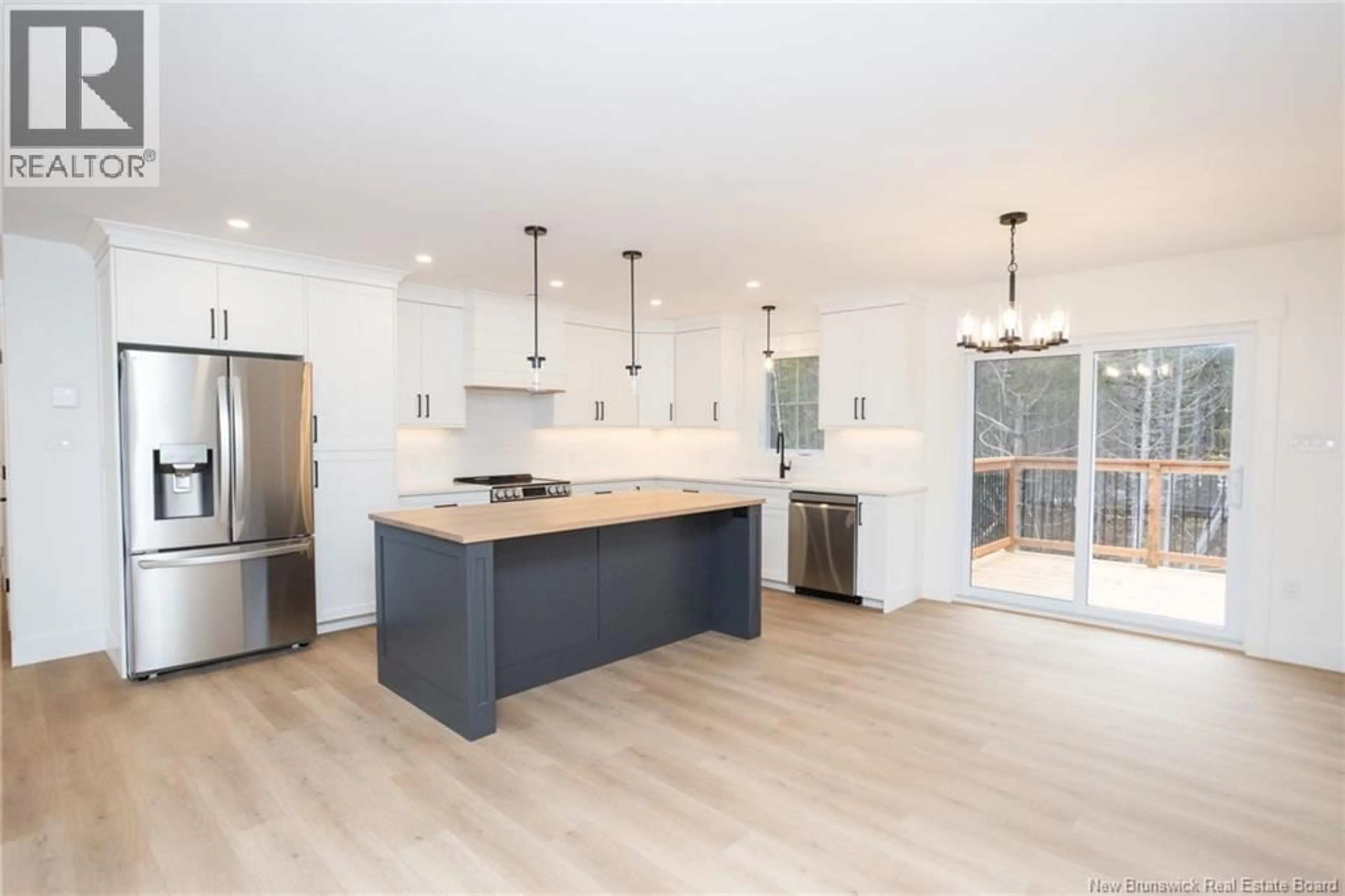 Open concept kitchen, wood/laminate floor for 4 CINDY LANE, Rusagonis New Brunswick E3B0V9