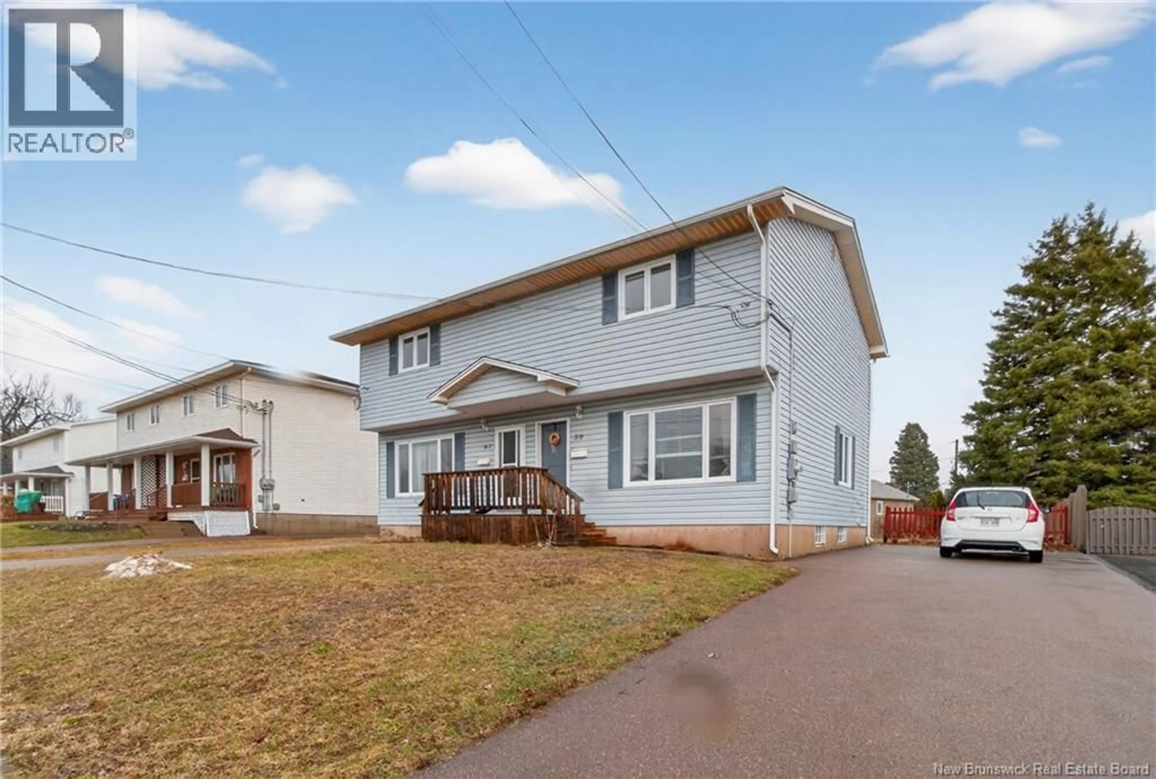 Home with vinyl exterior material, street for 59-61 BERRY STREET, Moncton New Brunswick E1A6G3