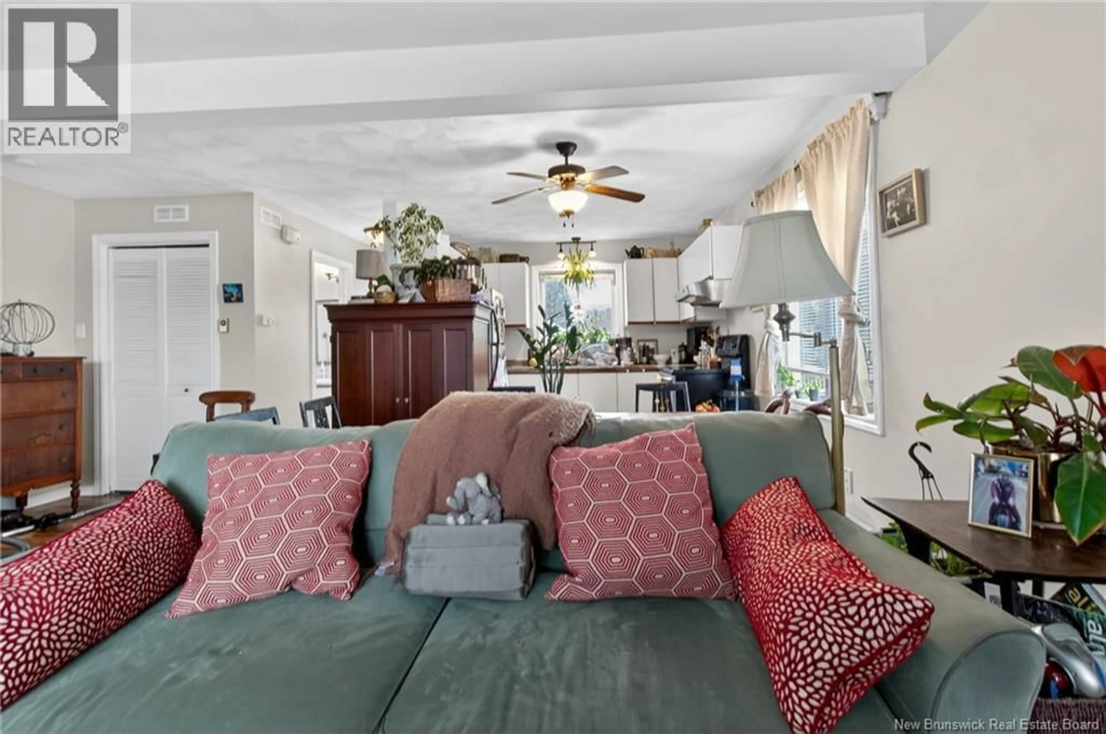 Living room with furniture, ceramic/tile floor for 59-61 BERRY STREET, Moncton New Brunswick E1A6G3