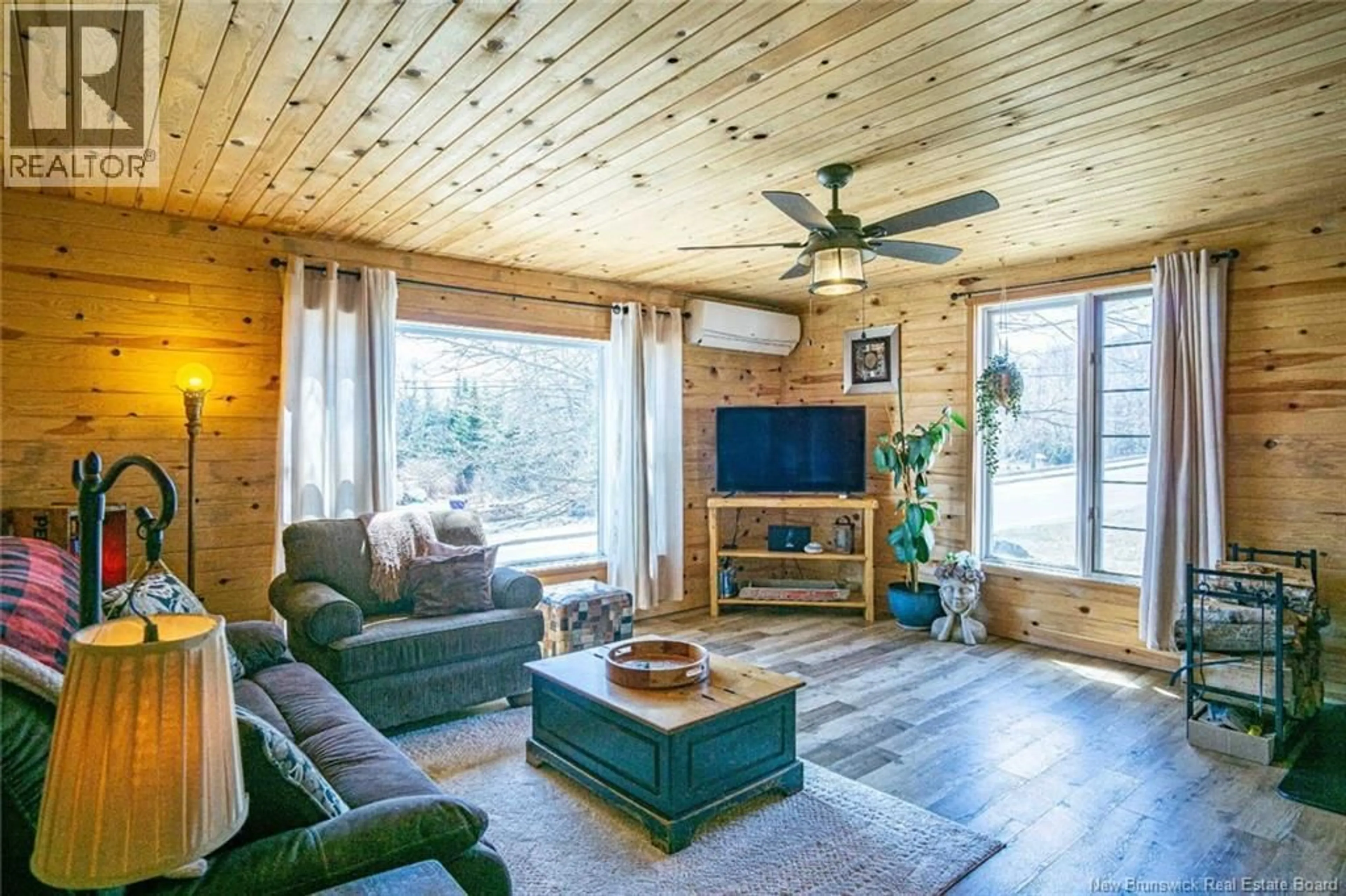 Living room with furniture, wood/laminate floor for 94 WALLACE COVE ROAD, Blacks Harbour New Brunswick E5H1H1