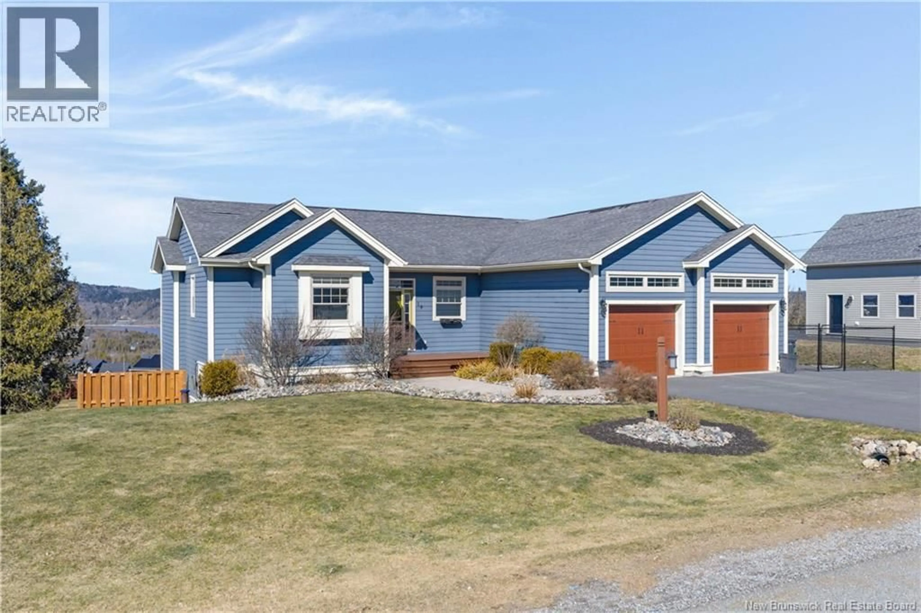 Home with vinyl exterior material, street for 19 PIONEER AVENUE, Quispamsis New Brunswick E2G0B1