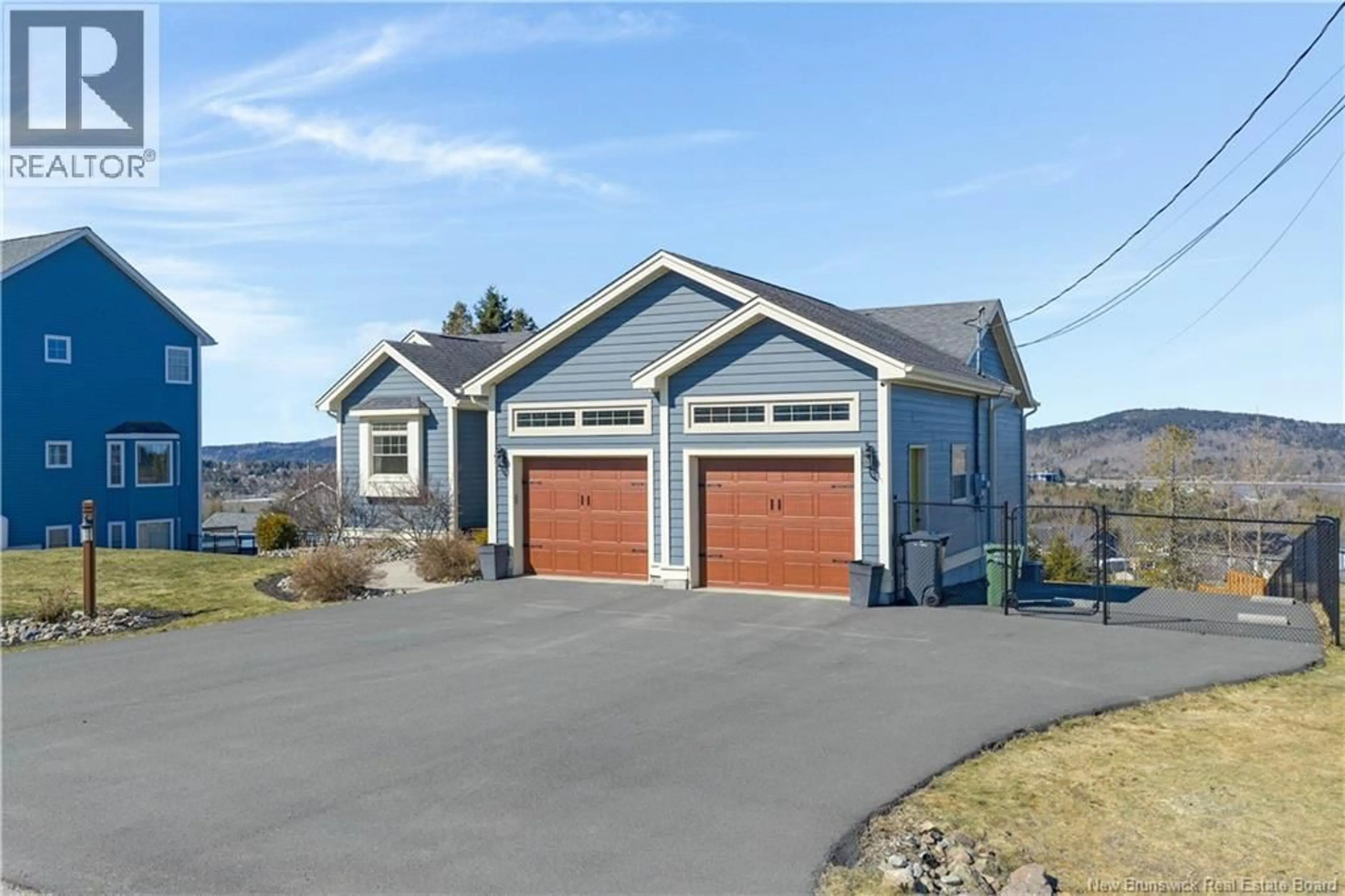 Home with vinyl exterior material, street for 19 PIONEER AVENUE, Quispamsis New Brunswick E2G0B1