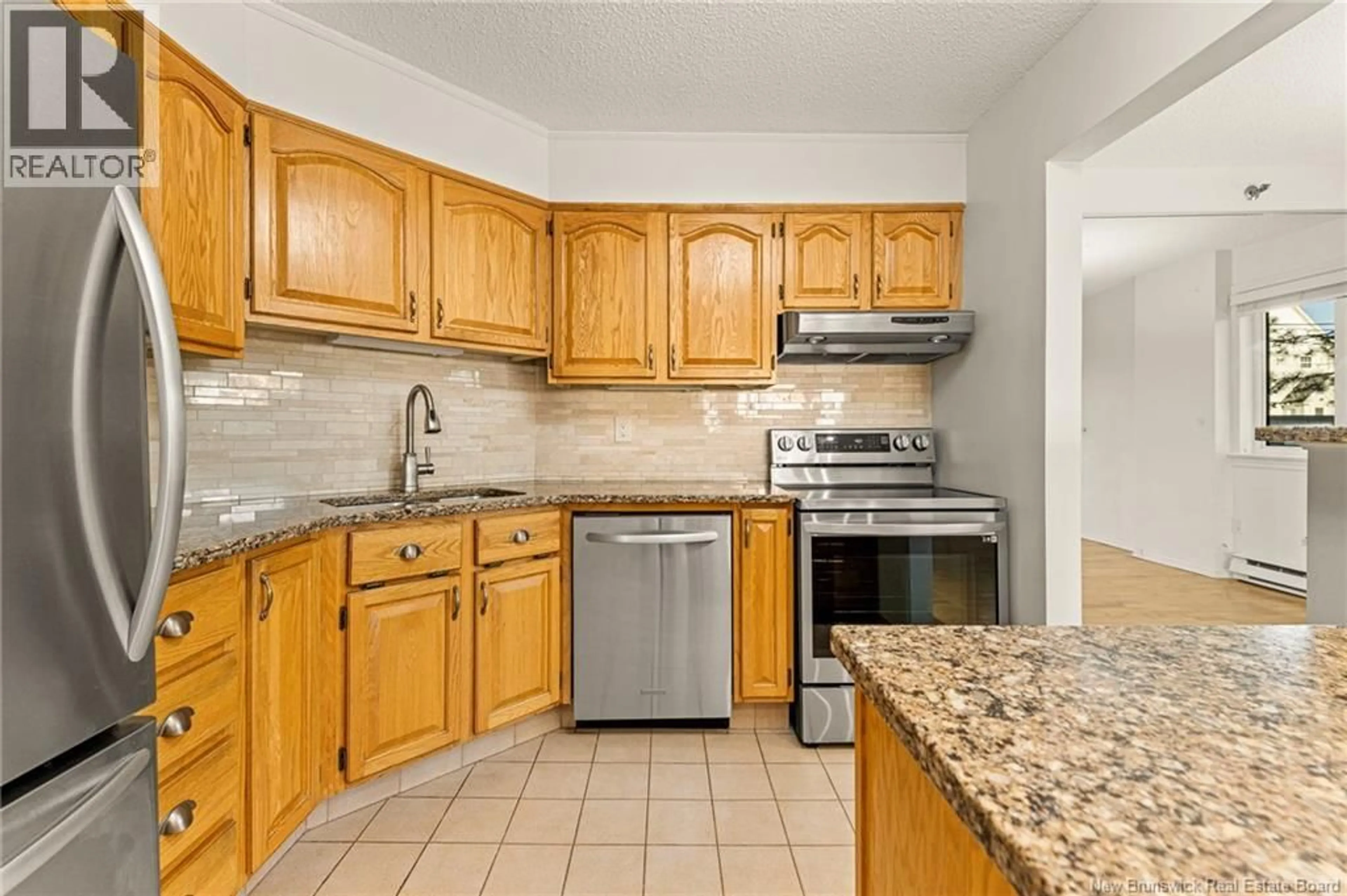 Standard kitchen, ceramic/tile floor for 107 - 191 QUEEN STREET, Moncton New Brunswick E1C1L3