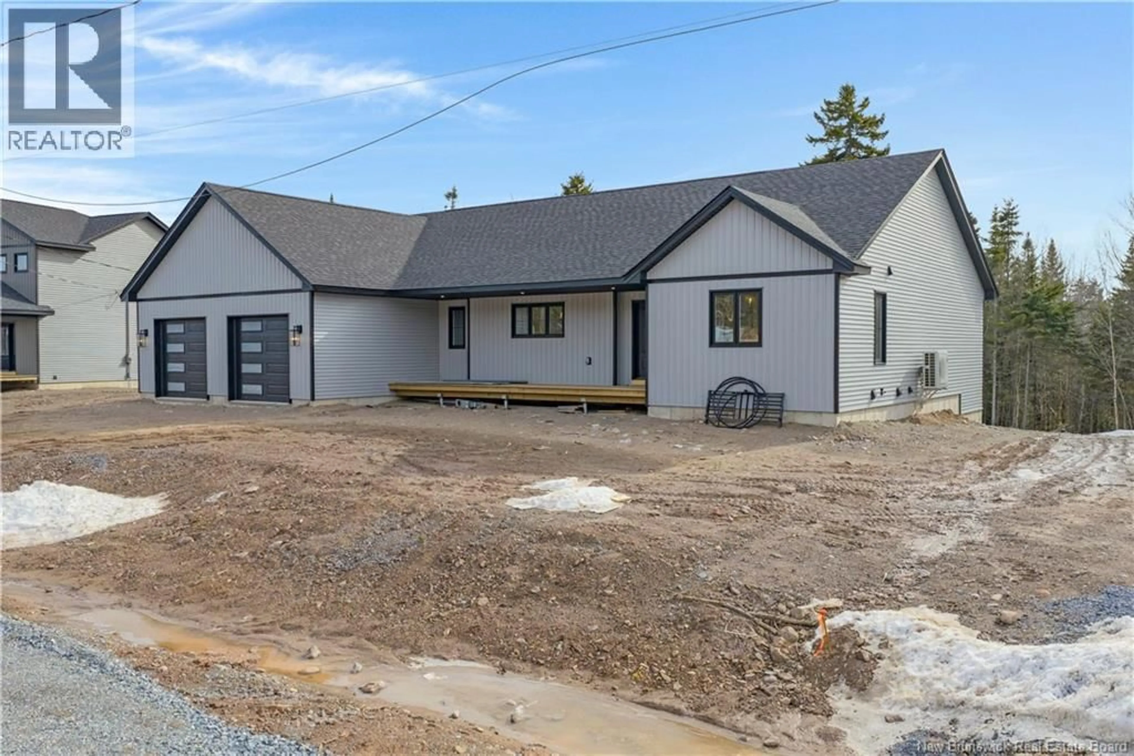 A pic from outside/outdoor area/front of a property/back of a property/a pic from drone, building for 44 MONTANA DRIVE, Quispamsis New Brunswick E2E0W2