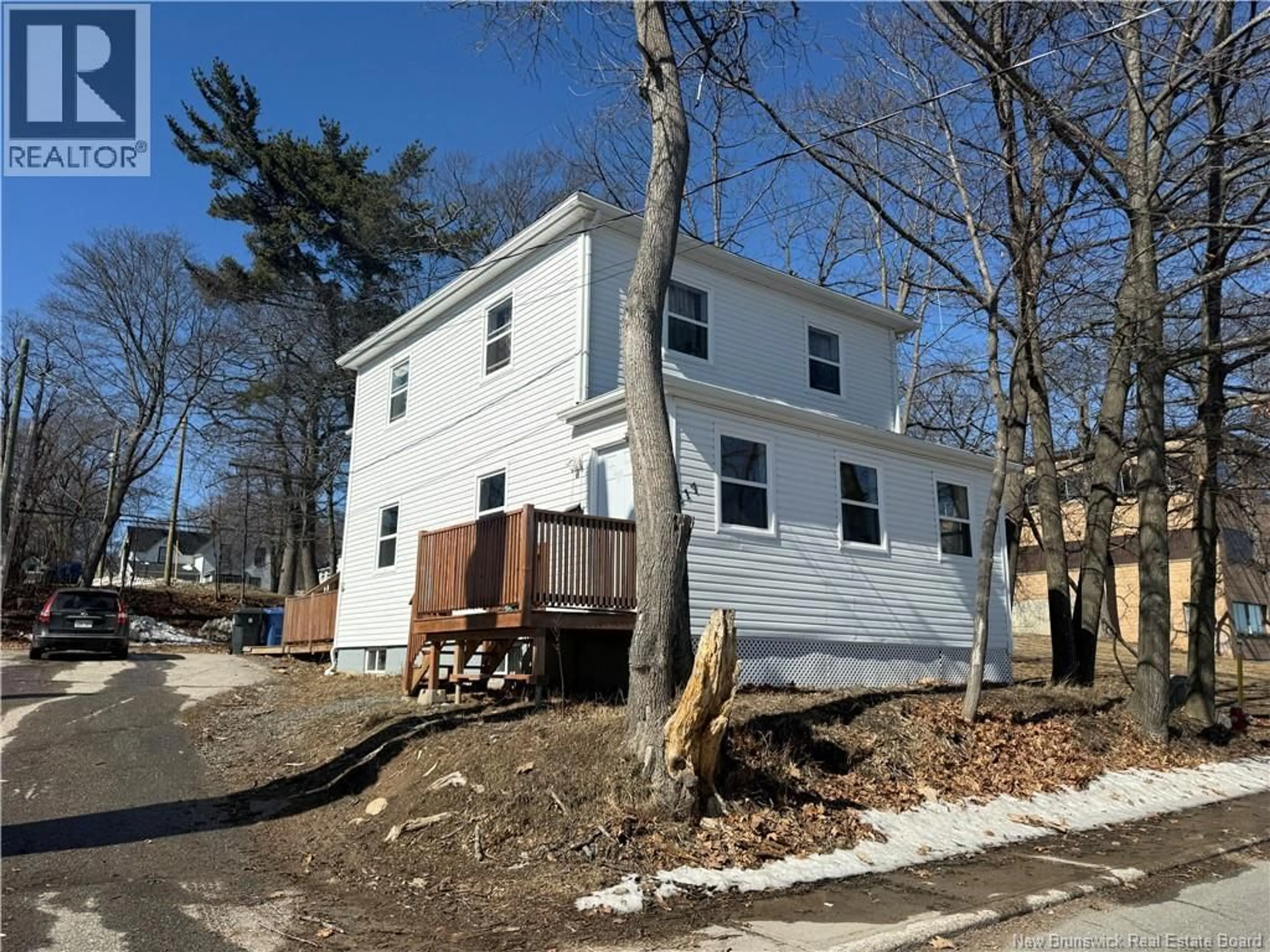 Home with vinyl exterior material, street for 215-217 MARY STREET, Miramichi New Brunswick E1V1M9