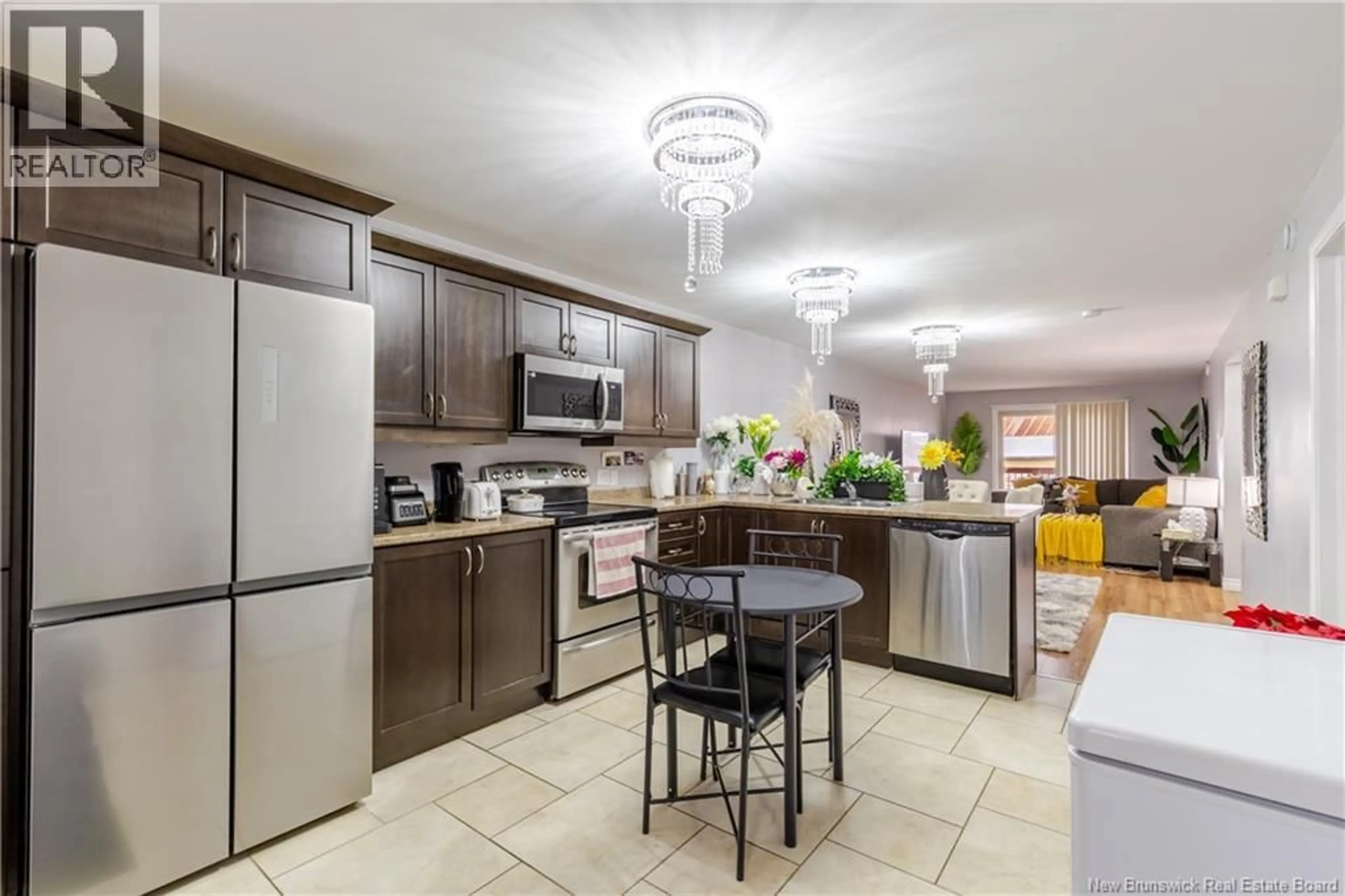 Open concept kitchen, ceramic/tile floor for 33 - 20 TRAILSIDE LANE, Fredericton New Brunswick E3A1R7