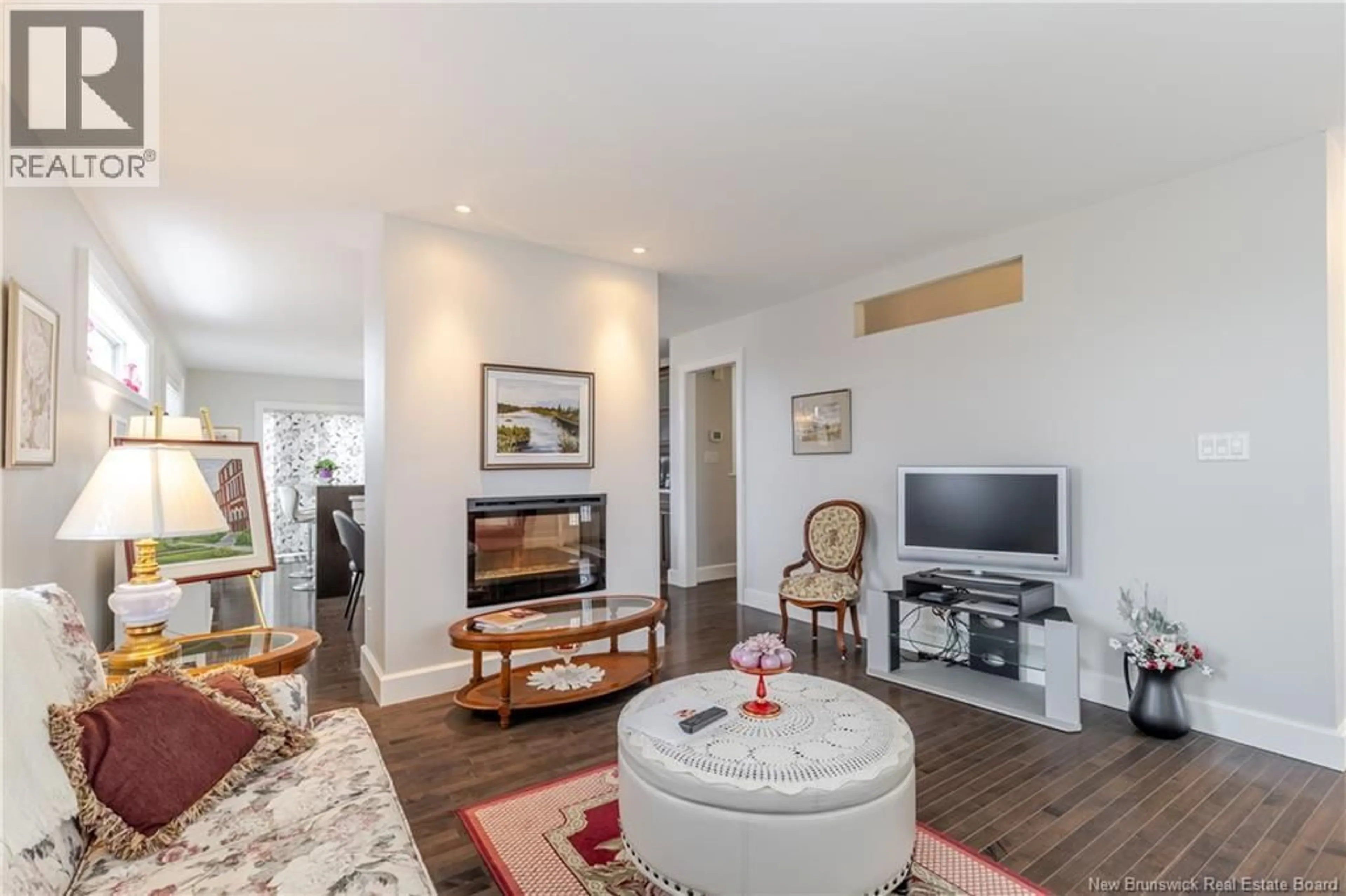 Living room with furniture, wood/laminate floor for 71 STAPLETON STREET, Fredericton New Brunswick E3C0J5