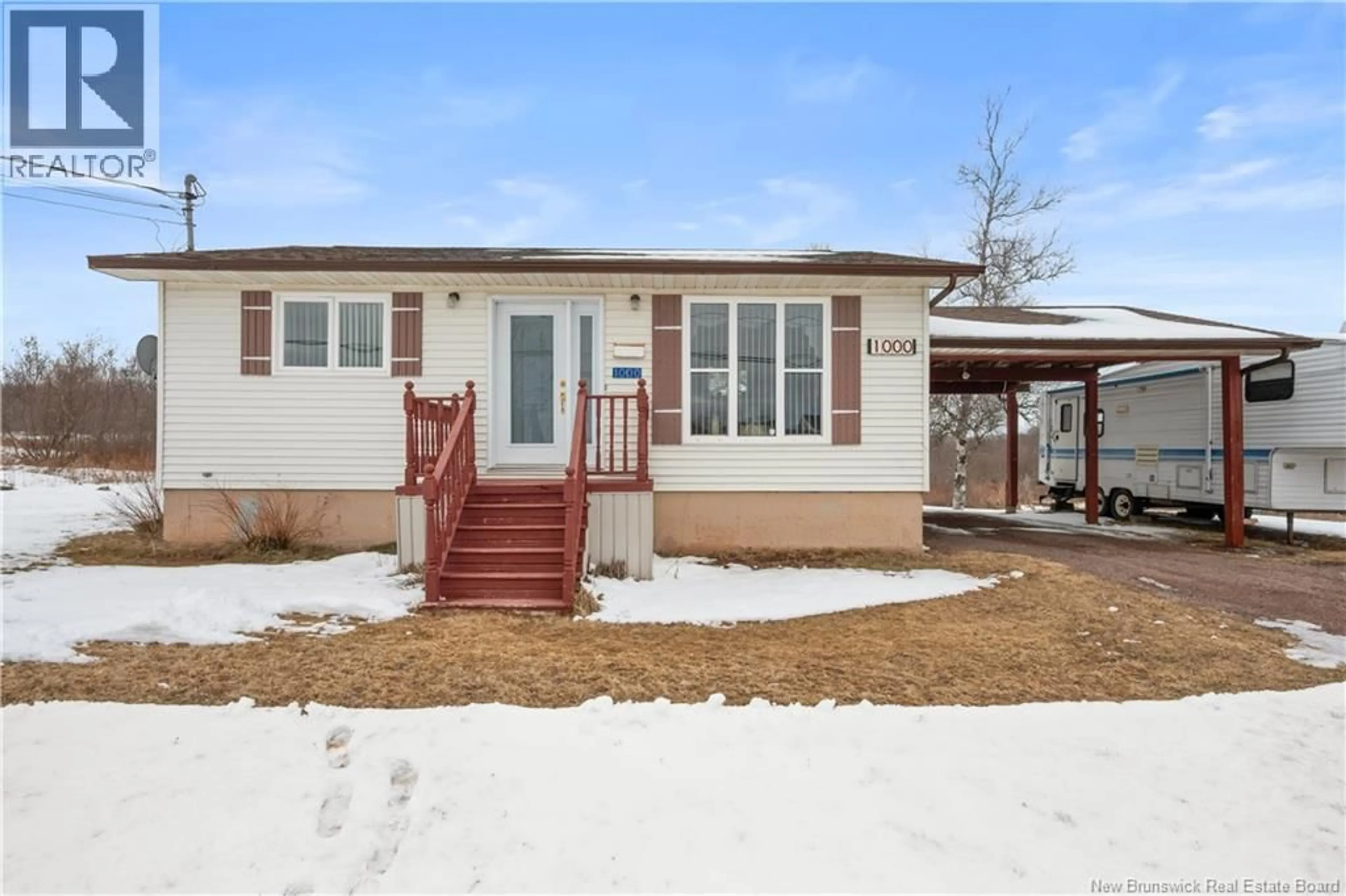 Home with vinyl exterior material, street for 1000 ST ANDRE RD, Saint-Andre-LeBlanc New Brunswick E4P6E9