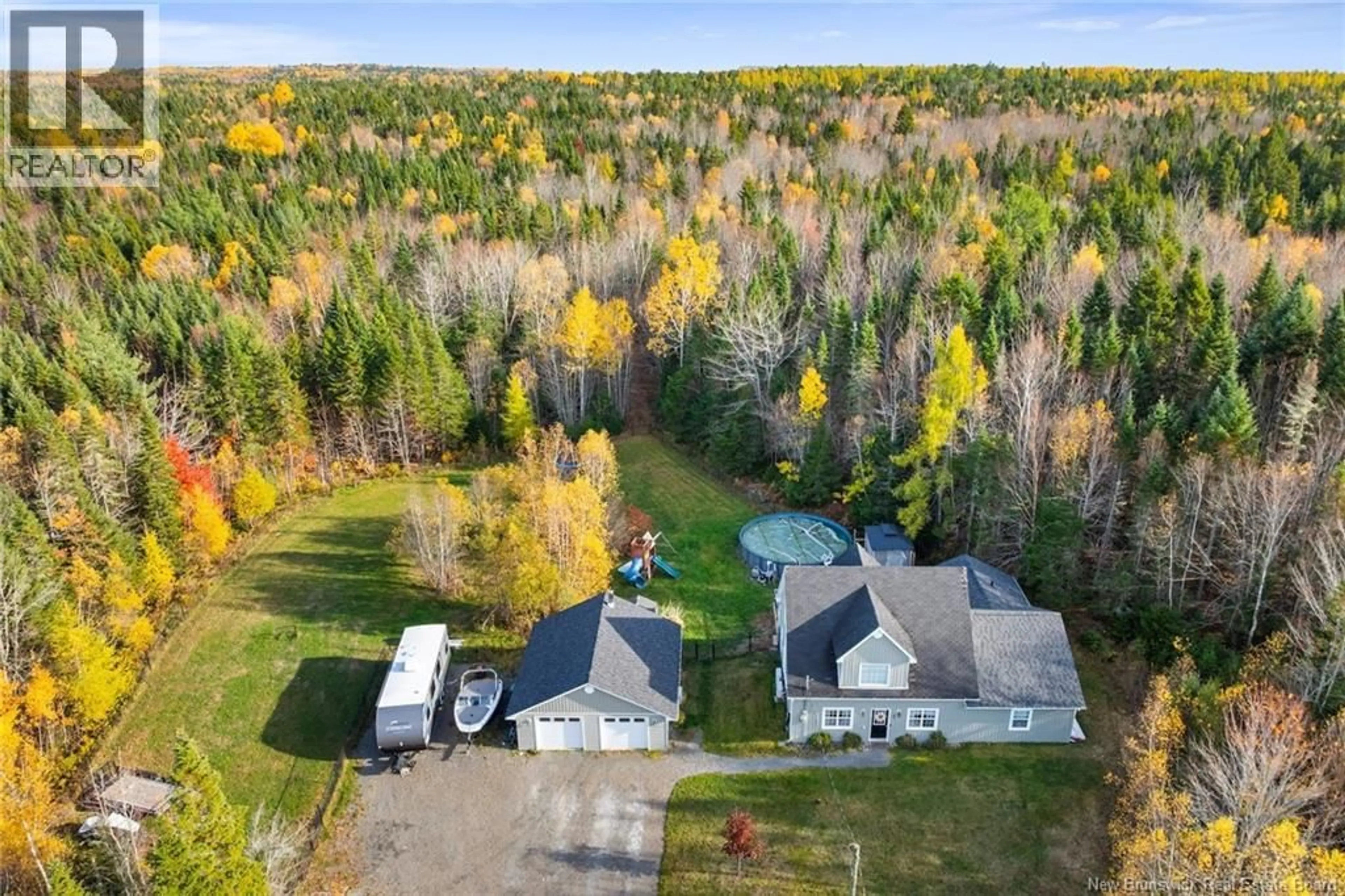 A pic from outside/outdoor area/front of a property/back of a property/a pic from drone, unknown for 82 LINT DRIVE, McLeod Hill New Brunswick E3G9N7