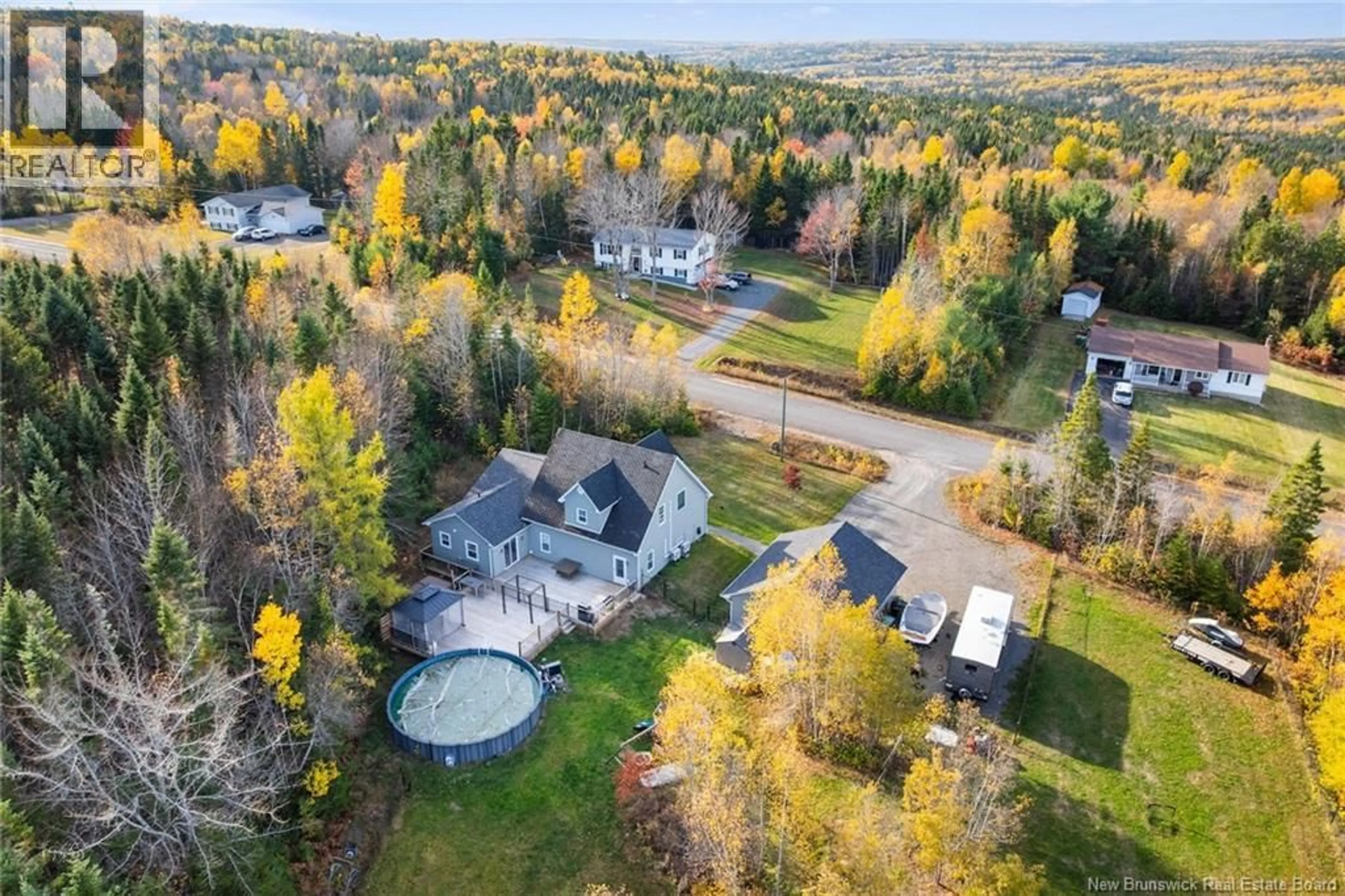 A pic from outside/outdoor area/front of a property/back of a property/a pic from drone, unknown for 82 LINT DRIVE, McLeod Hill New Brunswick E3G9N7