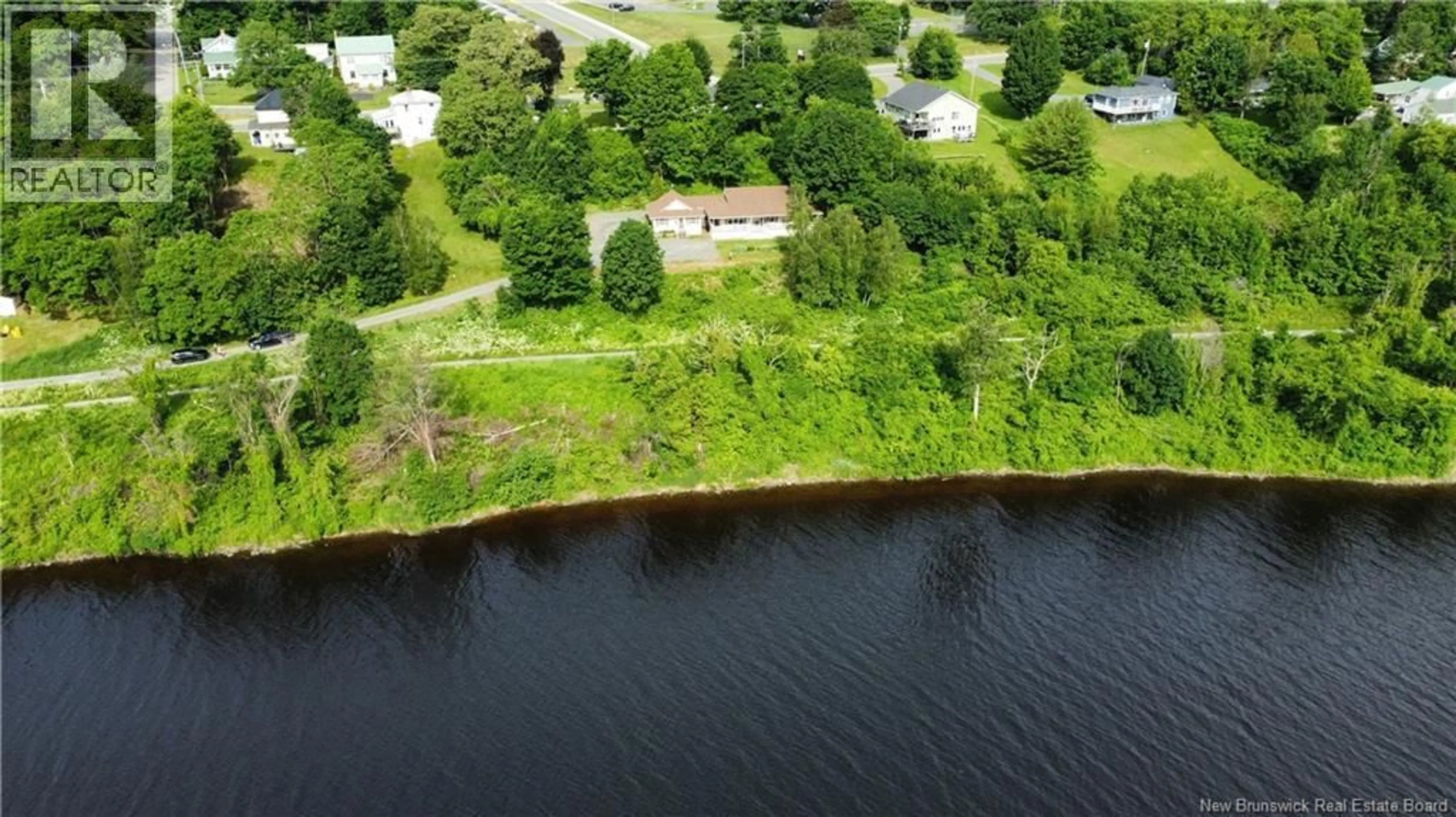 A pic from outside/outdoor area/front of a property/back of a property/a pic from drone, water/lake/river/ocean view for 105 BRIDGE STREET, Woodstock New Brunswick E7M5Y7