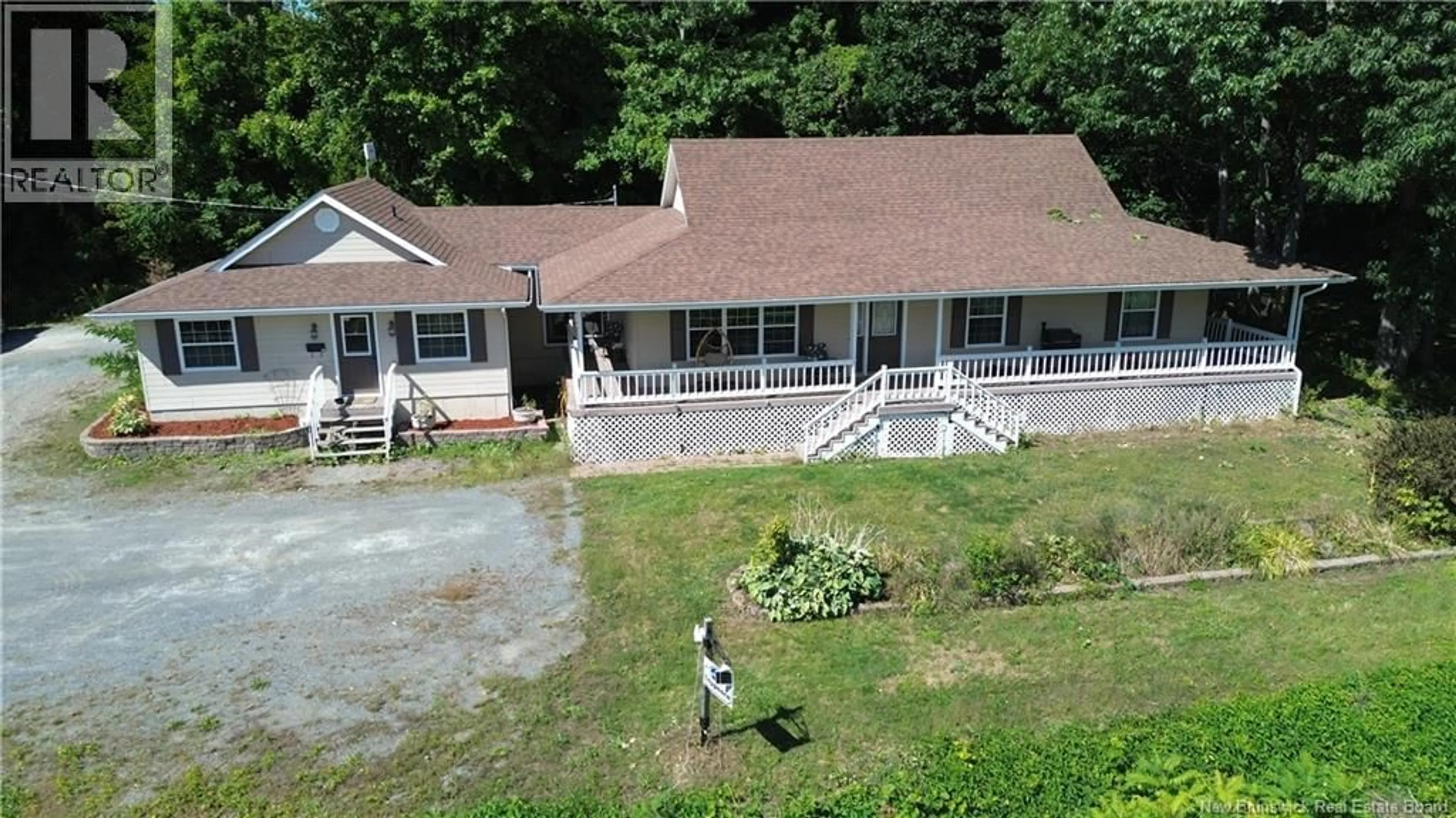 A pic from outside/outdoor area/front of a property/back of a property/a pic from drone, water/lake/river/ocean view for 105 BRIDGE STREET, Woodstock New Brunswick E7M5Y7