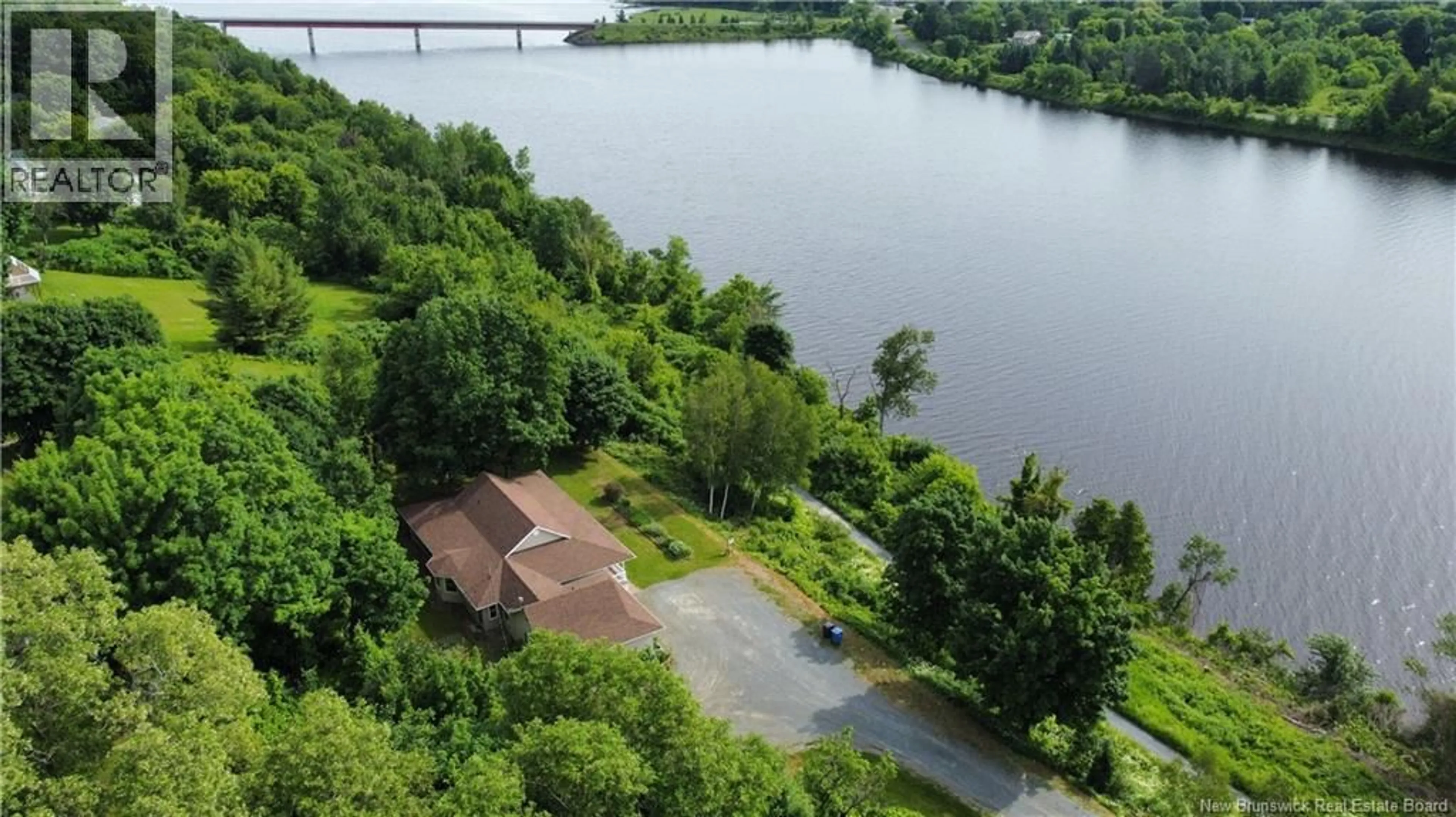 A pic from outside/outdoor area/front of a property/back of a property/a pic from drone, water/lake/river/ocean view for 105 BRIDGE STREET, Woodstock New Brunswick E7M5Y7