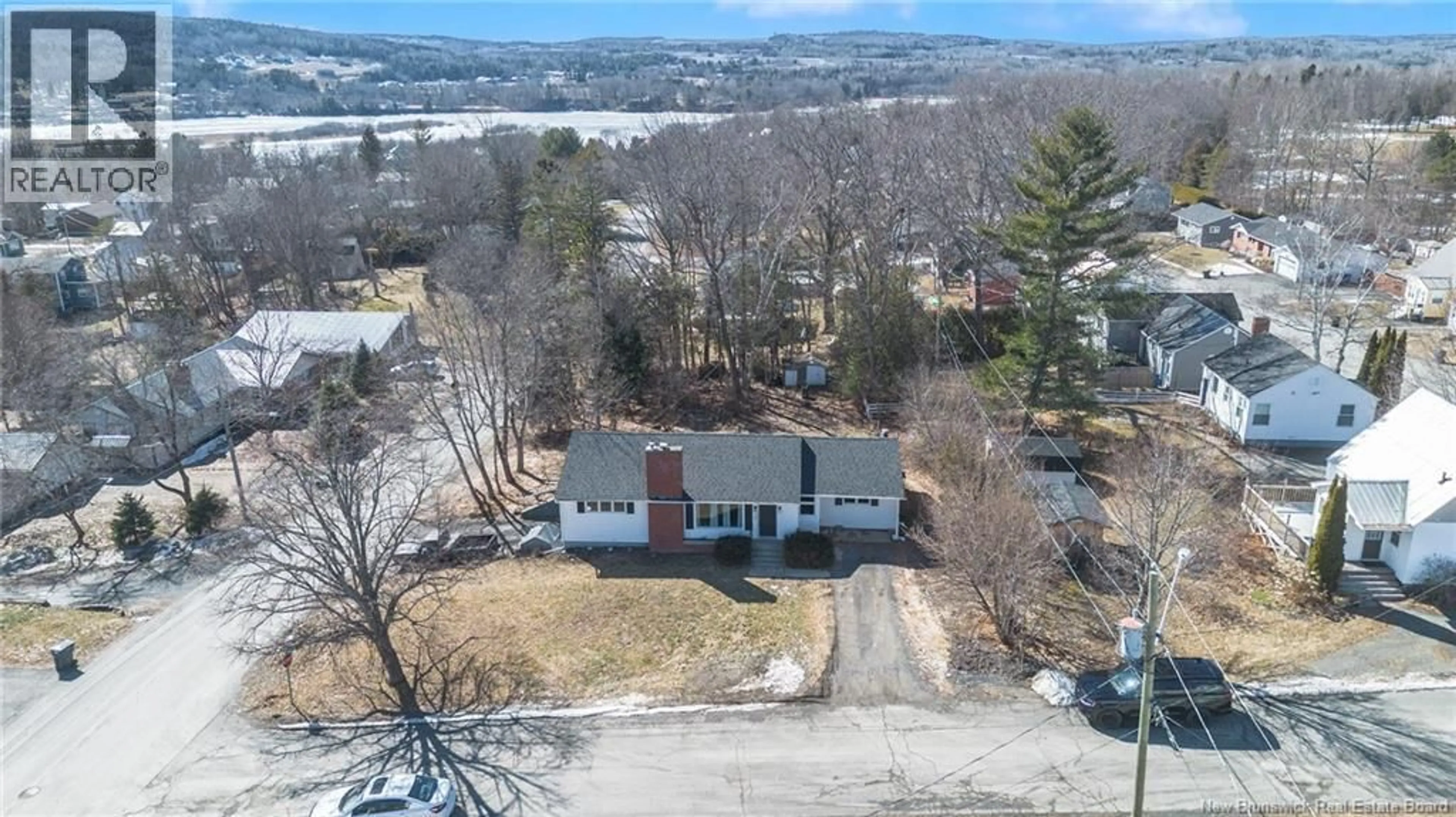 A pic from outside/outdoor area/front of a property/back of a property/a pic from drone, mountain view for 101 DOUGLAS AVENUE, Woodstock New Brunswick E7M5Z8
