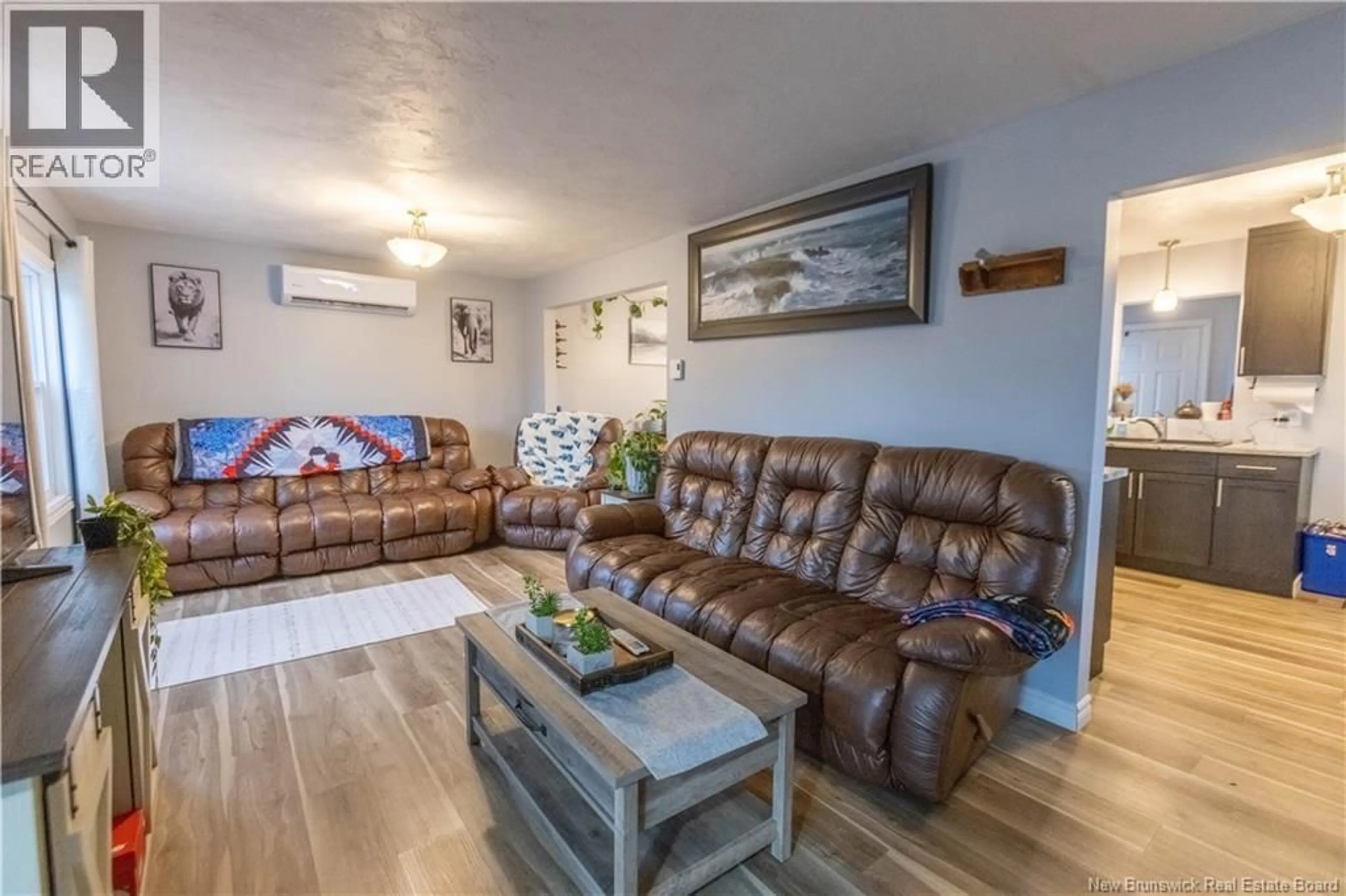 Living room with furniture, wood/laminate floor for 14 STEPHENS DRIVE, Sackville New Brunswick E4L1J5