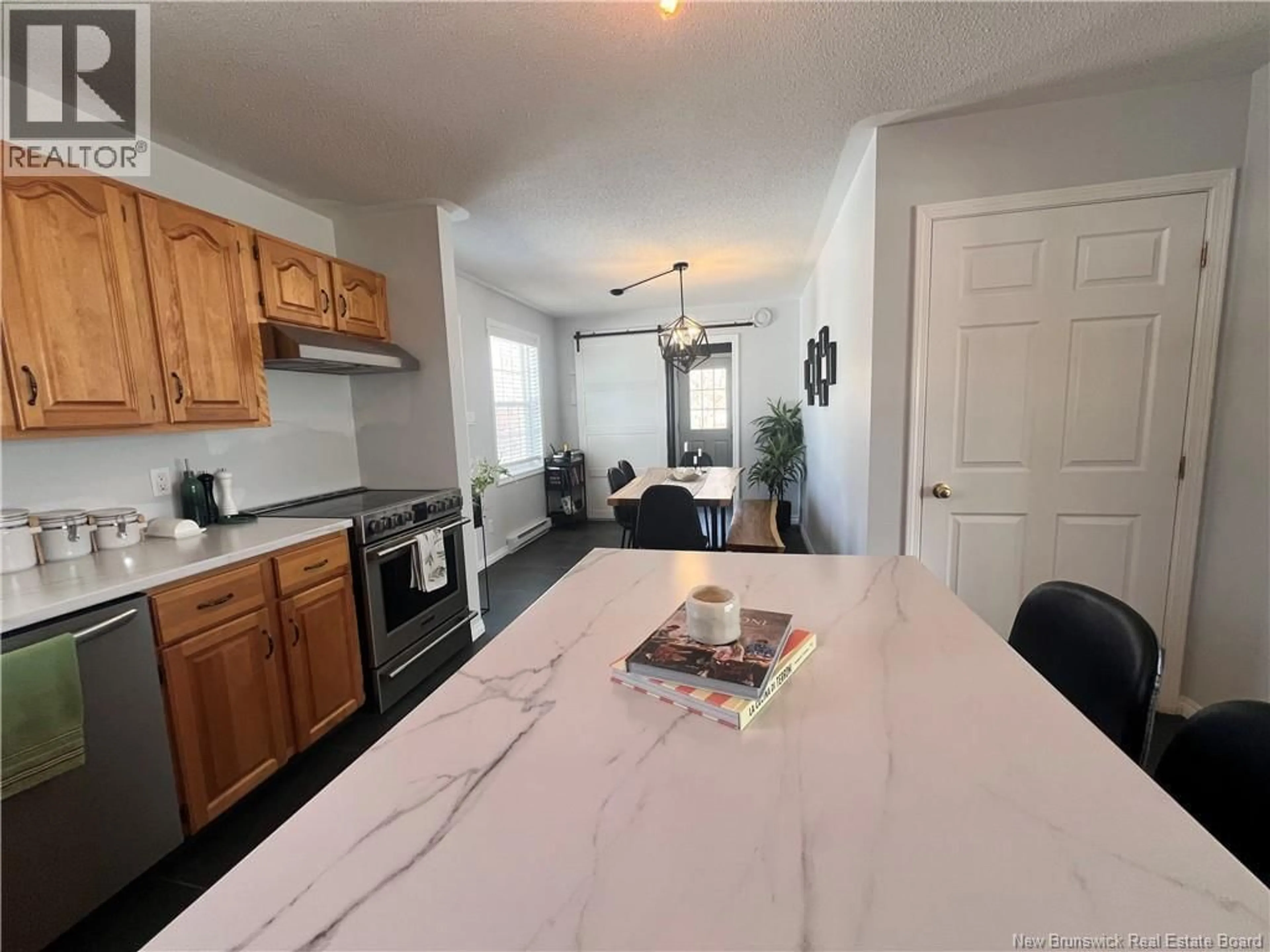 Open concept kitchen, ceramic/tile floor for 15 BROOKSIDE LANE, St George New Brunswick E5C1A5