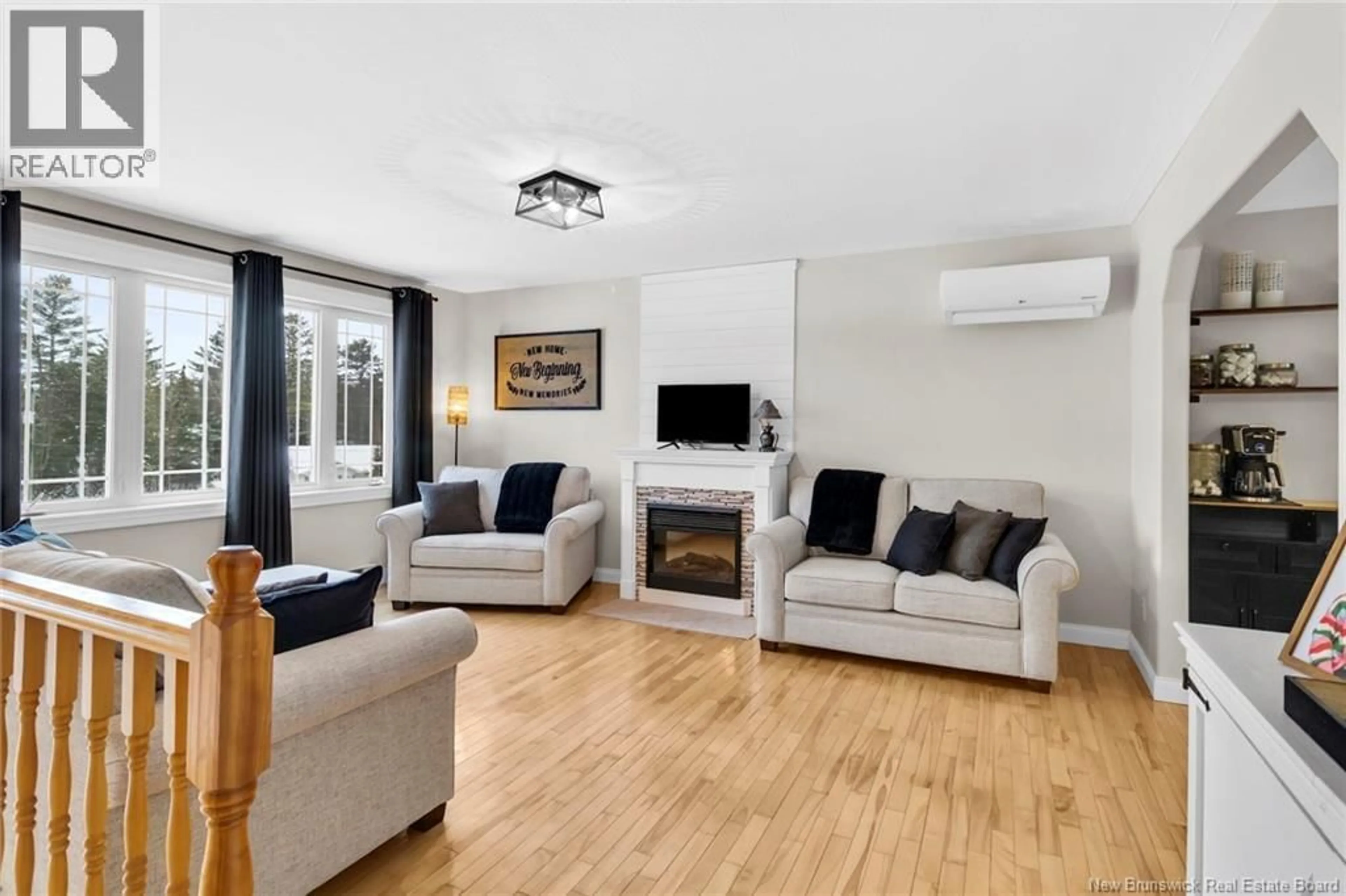 Living room with furniture, wood/laminate floor for 186 ROLLING HILL DRIVE, Richibucto Road New Brunswick E3A9V5