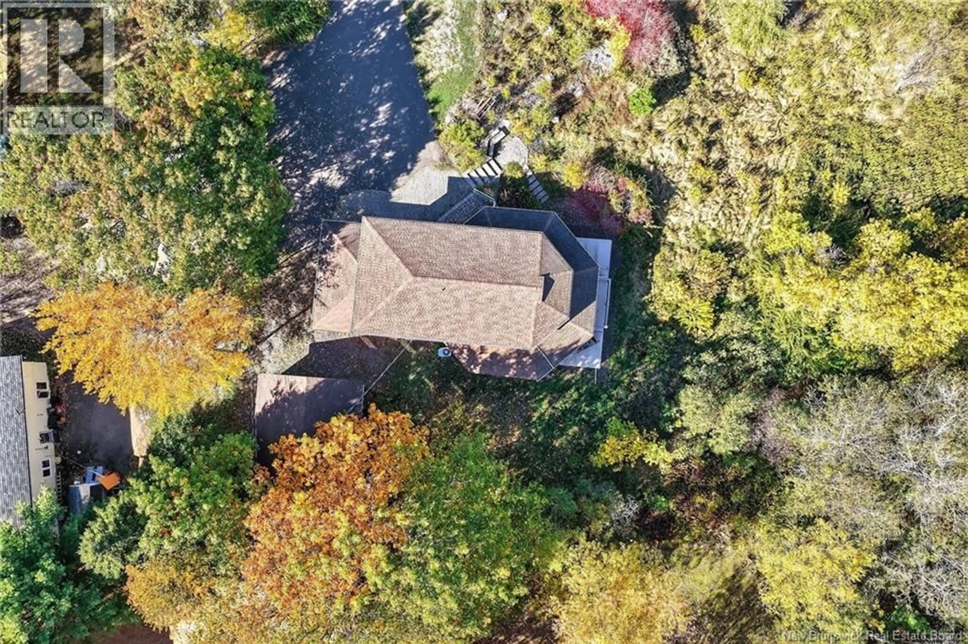 A pic from outside/outdoor area/front of a property/back of a property/a pic from drone, unknown for 380 SALISBURY ROAD, Moncton New Brunswick E1E1A7