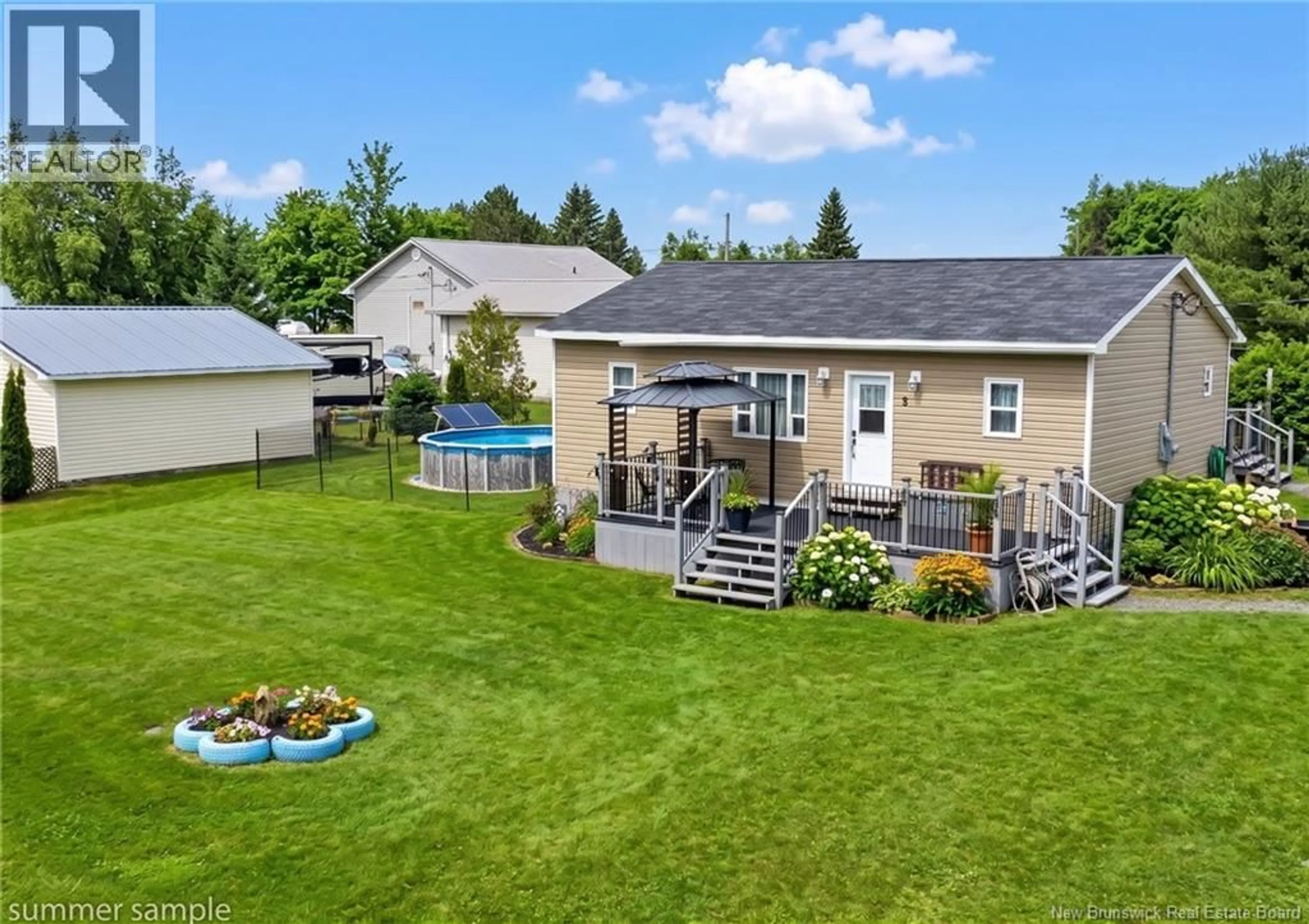 A pic from outside/outdoor area/front of a property/back of a property/a pic from drone, water/lake/river/ocean view for 3 BRIGHTON STREET, Boundary Creek New Brunswick E1G4B1