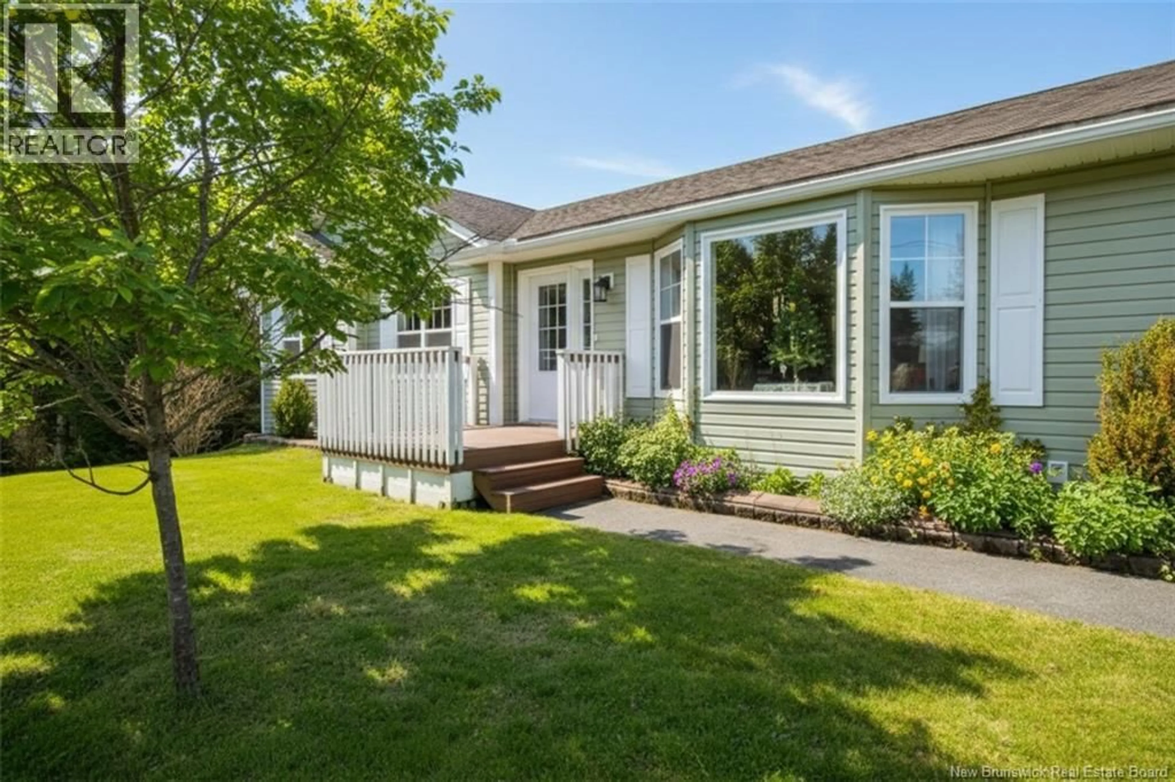 Home with vinyl exterior material, street for 21 EMERALD LAKE DRIVE, Saint John New Brunswick E2N2B6