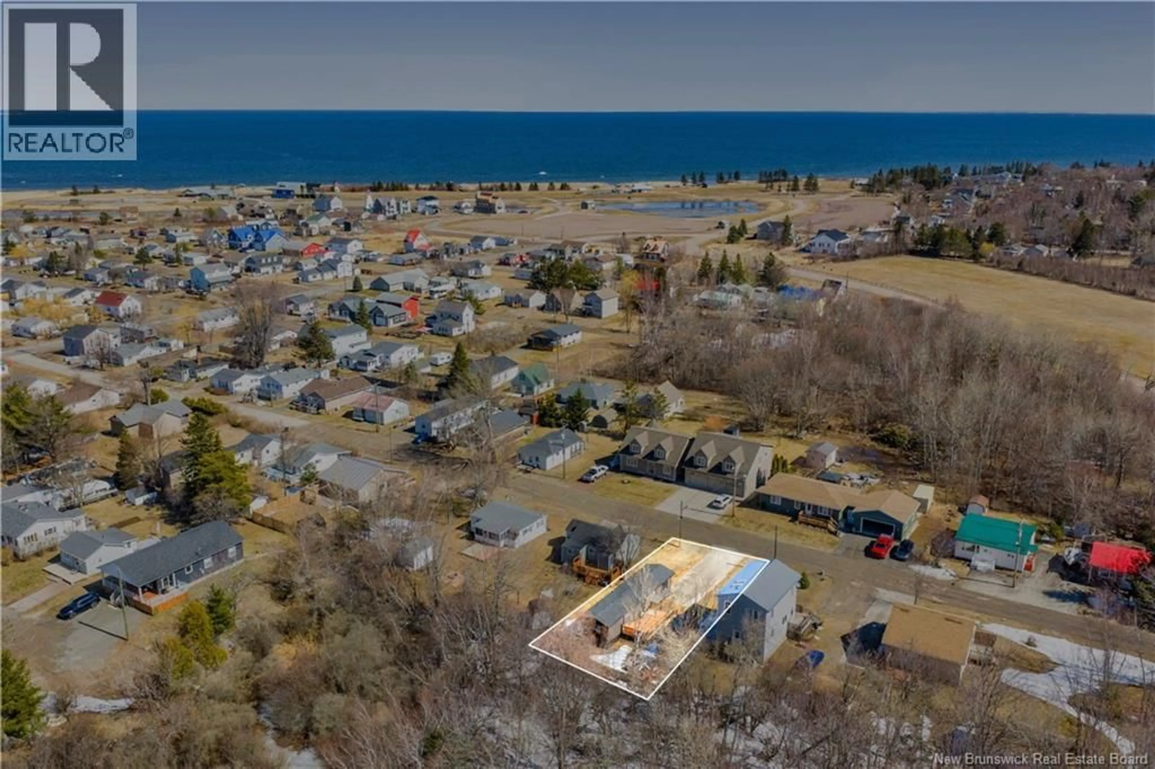 A pic from outside/outdoor area/front of a property/back of a property/a pic from drone, water/lake/river/ocean view for 16 FOURTH AVENUE, Pointe-Du-Chêne New Brunswick E4P4H7