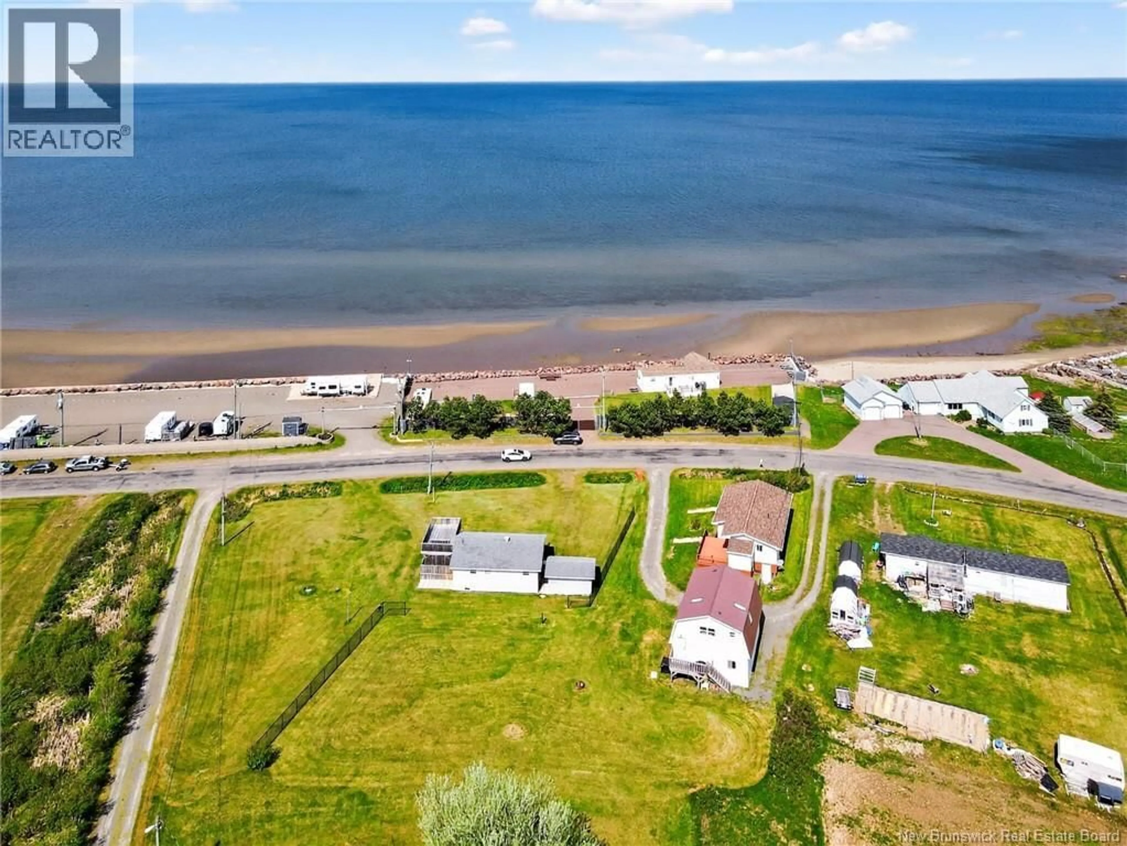 A pic from outside/outdoor area/front of a property/back of a property/a pic from drone, water/lake/river/ocean view for 157 DE LA COTE, Grande-Digue New Brunswick E4R1W8