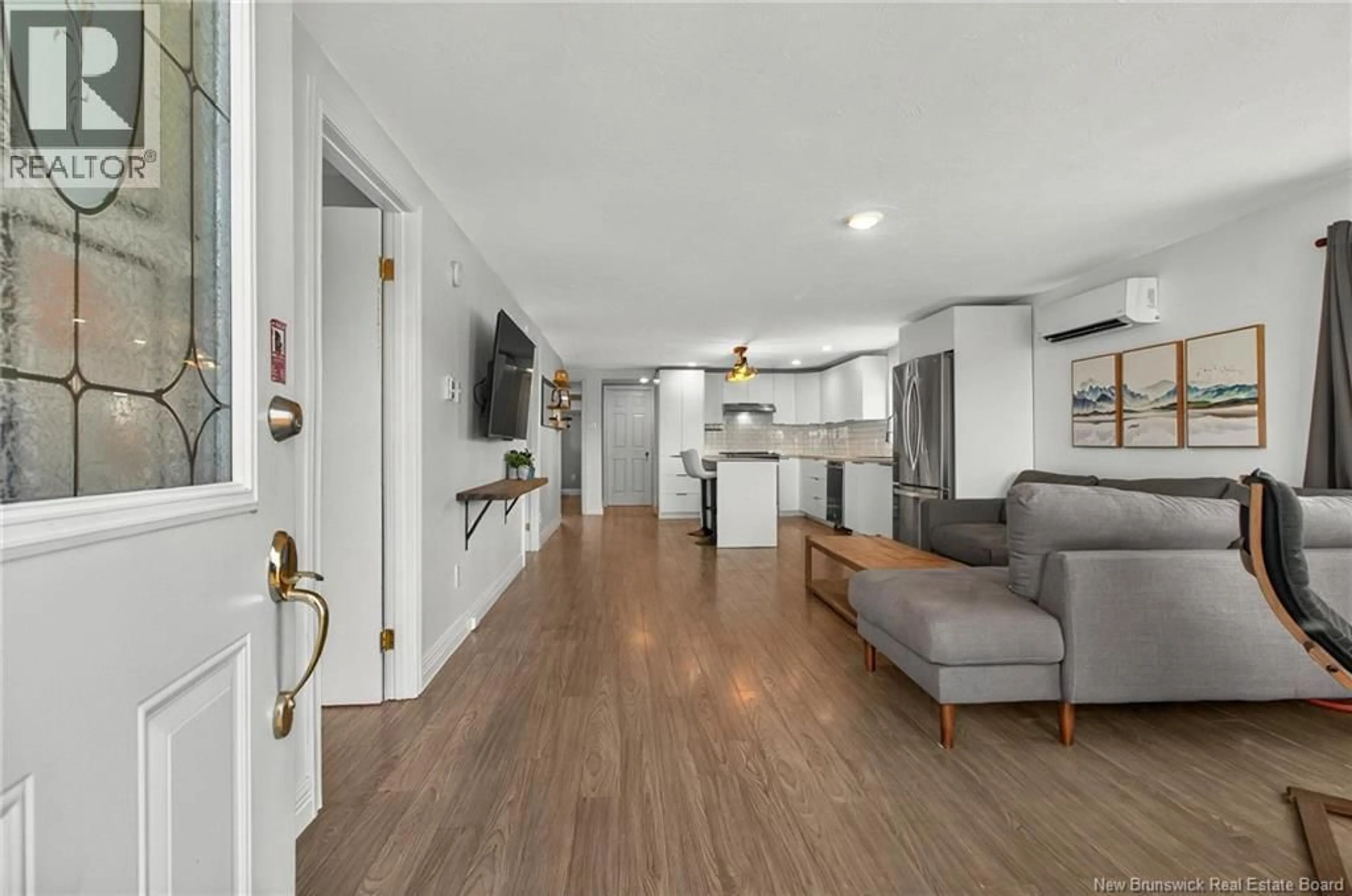 Open concept kitchen, wood/laminate floor for 157 DE LA COTE, Grande-Digue New Brunswick E4R1W8