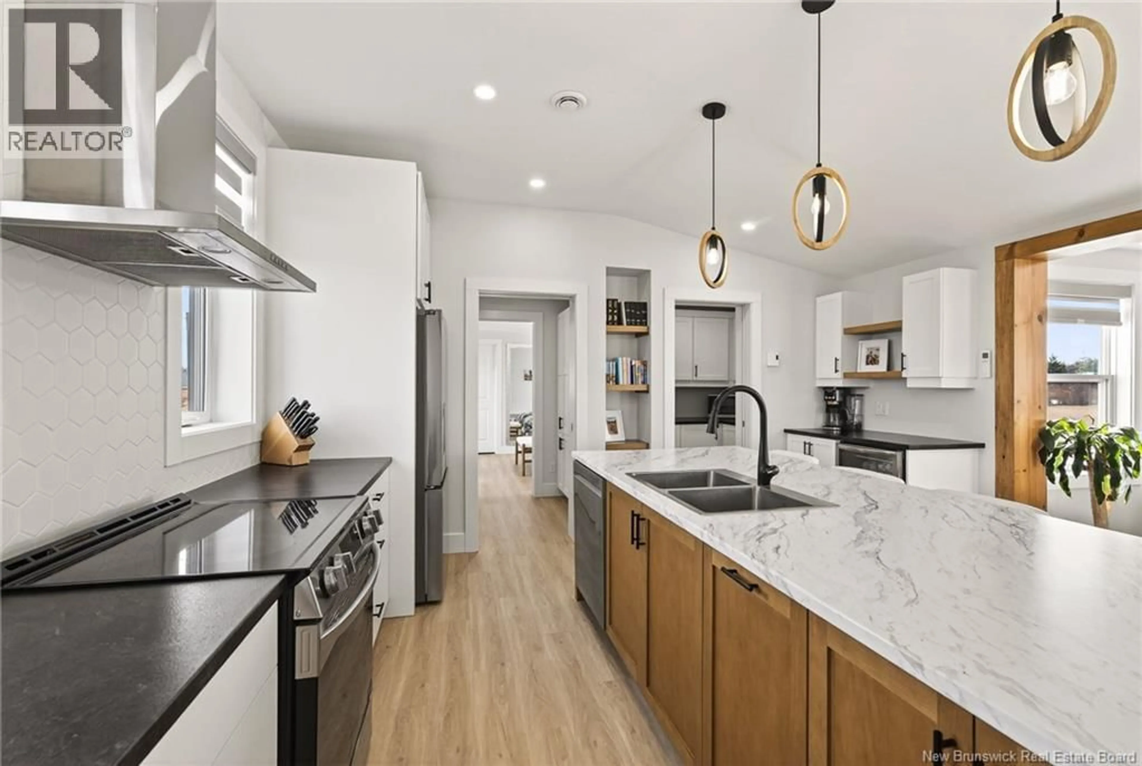 Open concept kitchen, ceramic/tile floor for 40 EDDIE STREET, Cap-Pelé New Brunswick E4N1S8