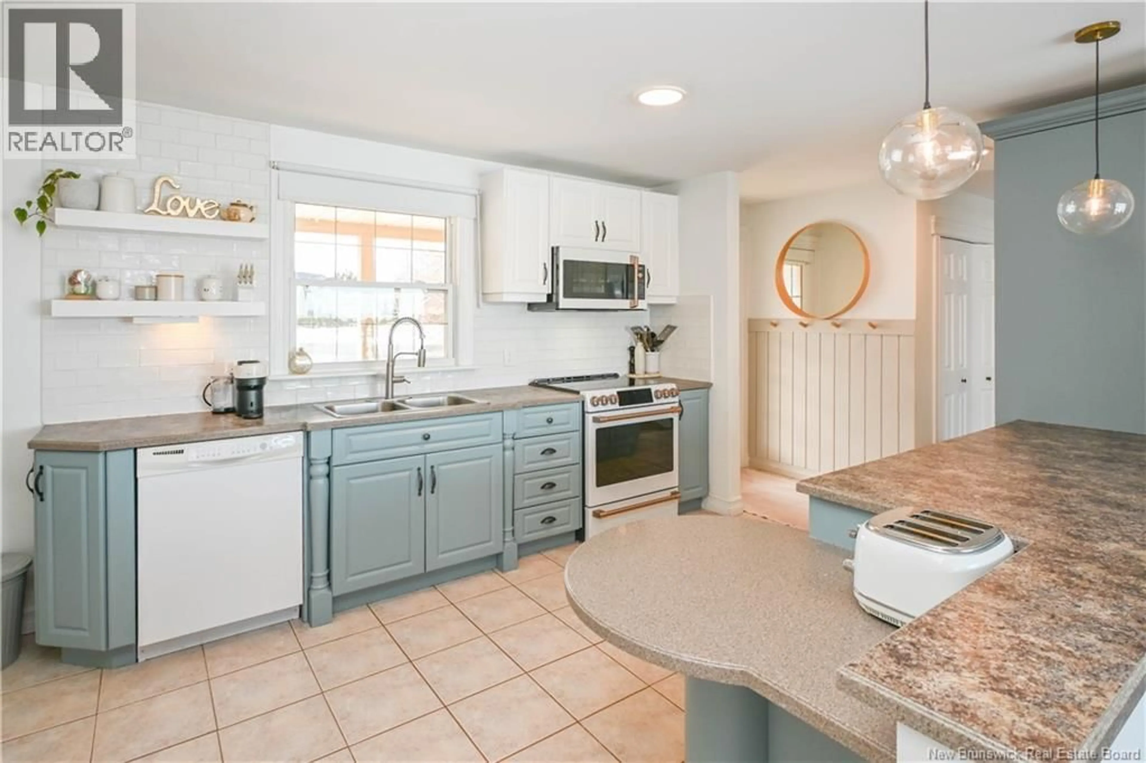 Open concept kitchen, ceramic/tile floor for 401 CÉLINE STREET, Tracadie New Brunswick E1X1A4