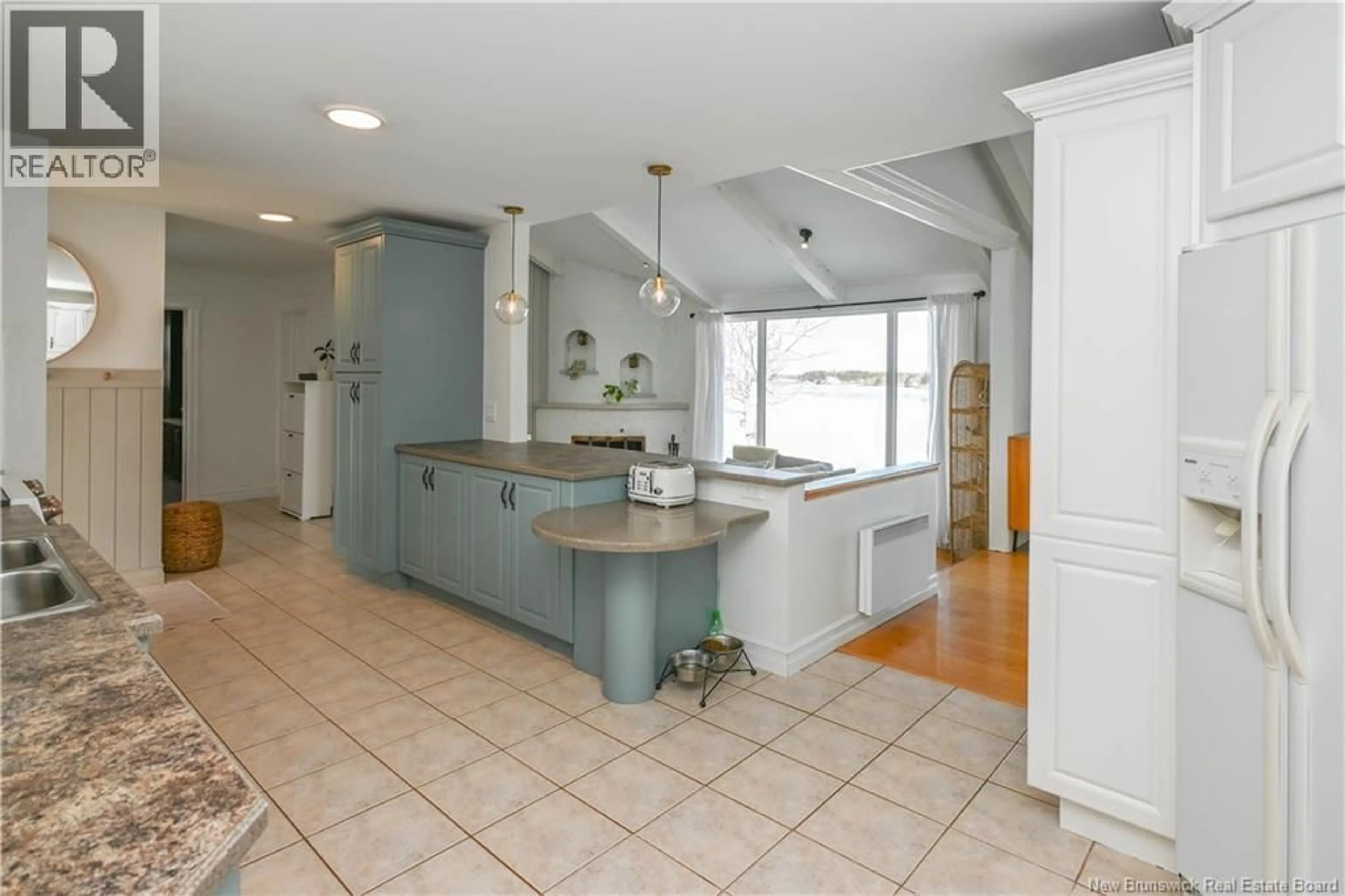 Open concept kitchen, ceramic/tile floor for 401 CÉLINE STREET, Tracadie New Brunswick E1X1A4