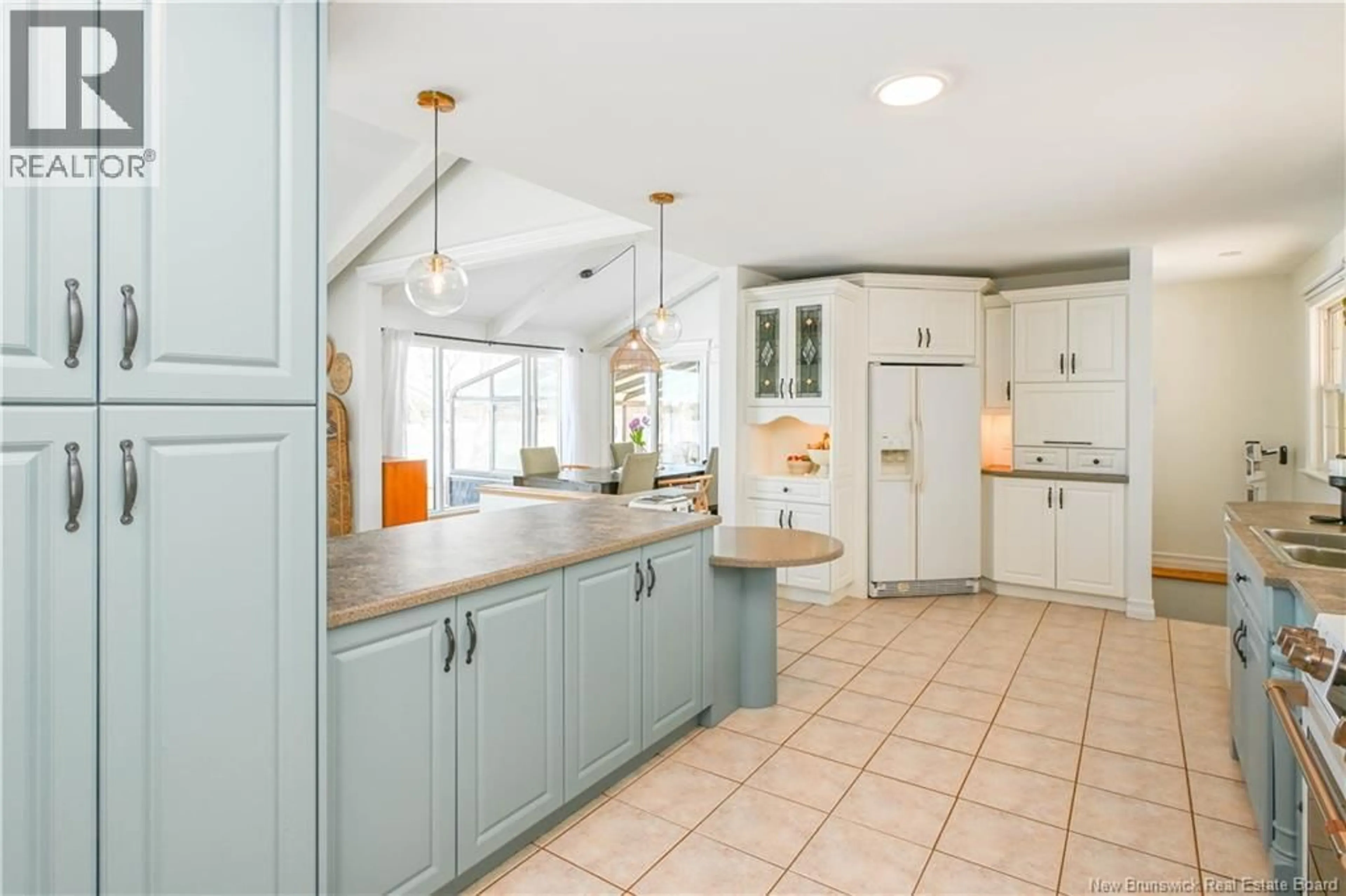 Open concept kitchen, ceramic/tile floor for 401 CÉLINE STREET, Tracadie New Brunswick E1X1A4