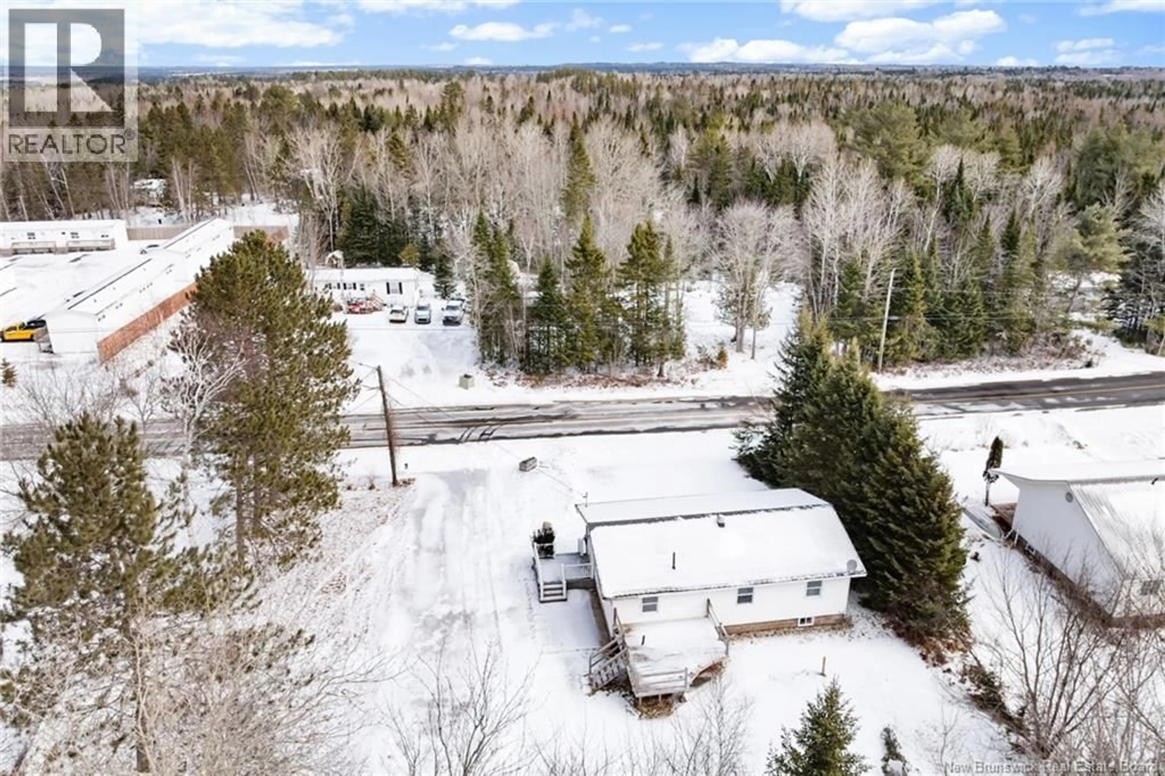 A pic from outside/outdoor area/front of a property/back of a property/a pic from drone, unknown for 186 KING STREET, Chipman New Brunswick E4A2J1