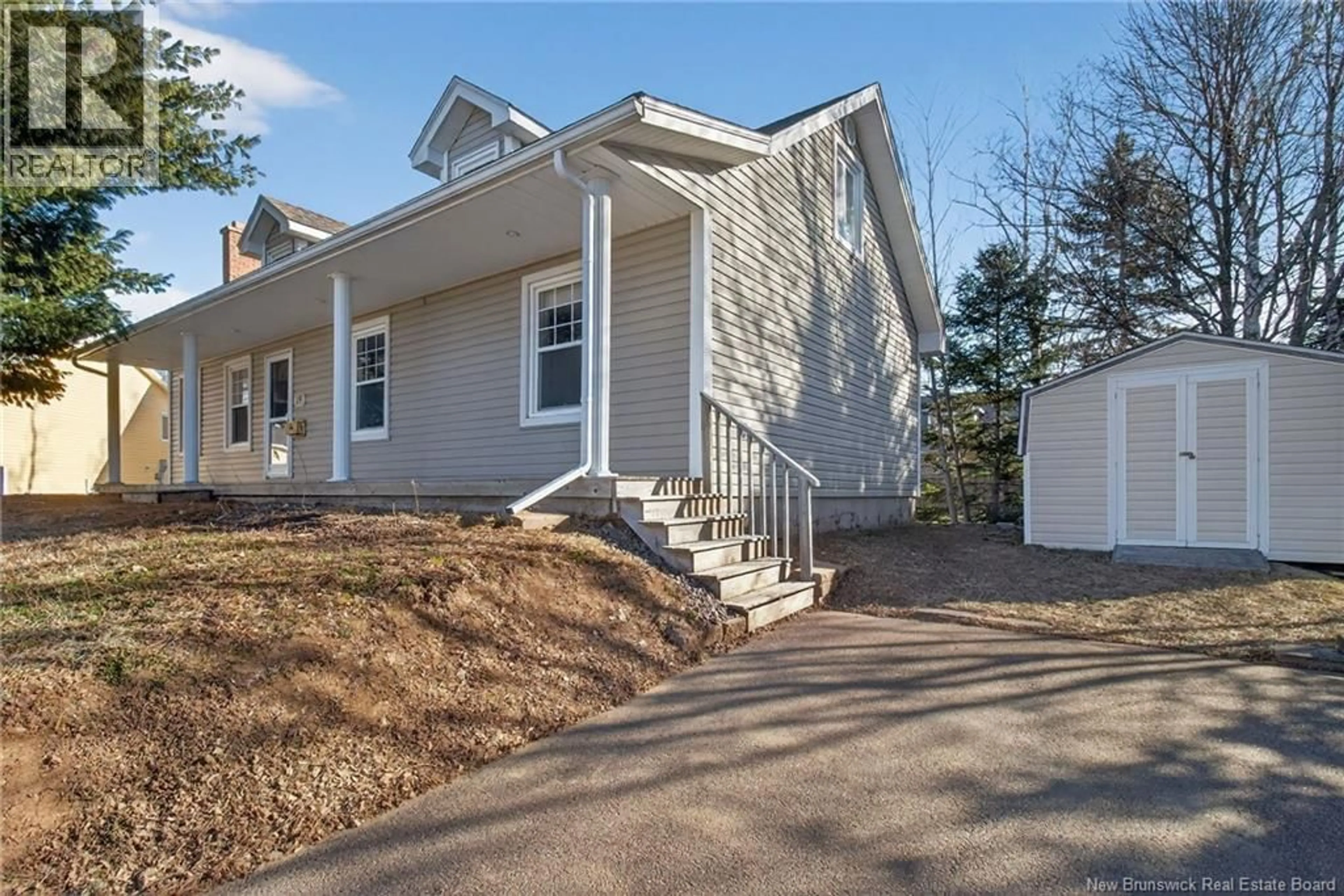 Home with vinyl exterior material, street for 19 LAROSE, Dieppe New Brunswick E1A5B7