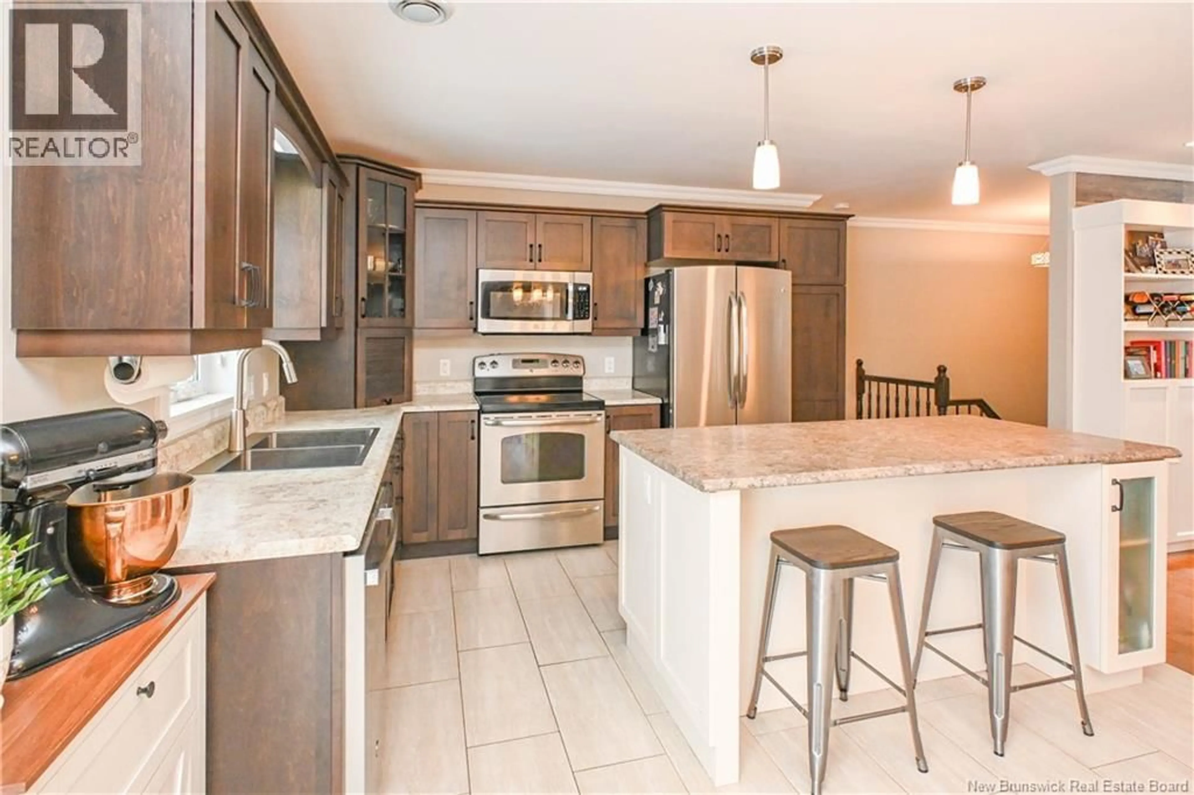 Open concept kitchen, ceramic/tile floor for 201 DES ERABLES STREET, Paquetville New Brunswick E8R1C7