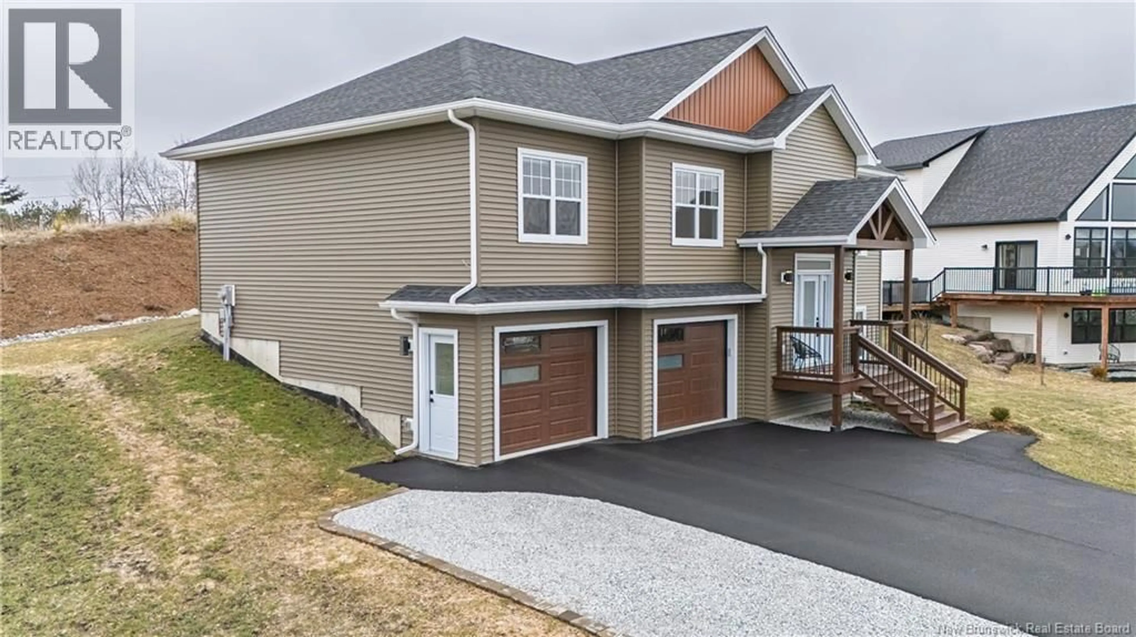 Home with vinyl exterior material, street for 14 APPLE BLOSSOM TRAIL, Hampton New Brunswick E5N0L7