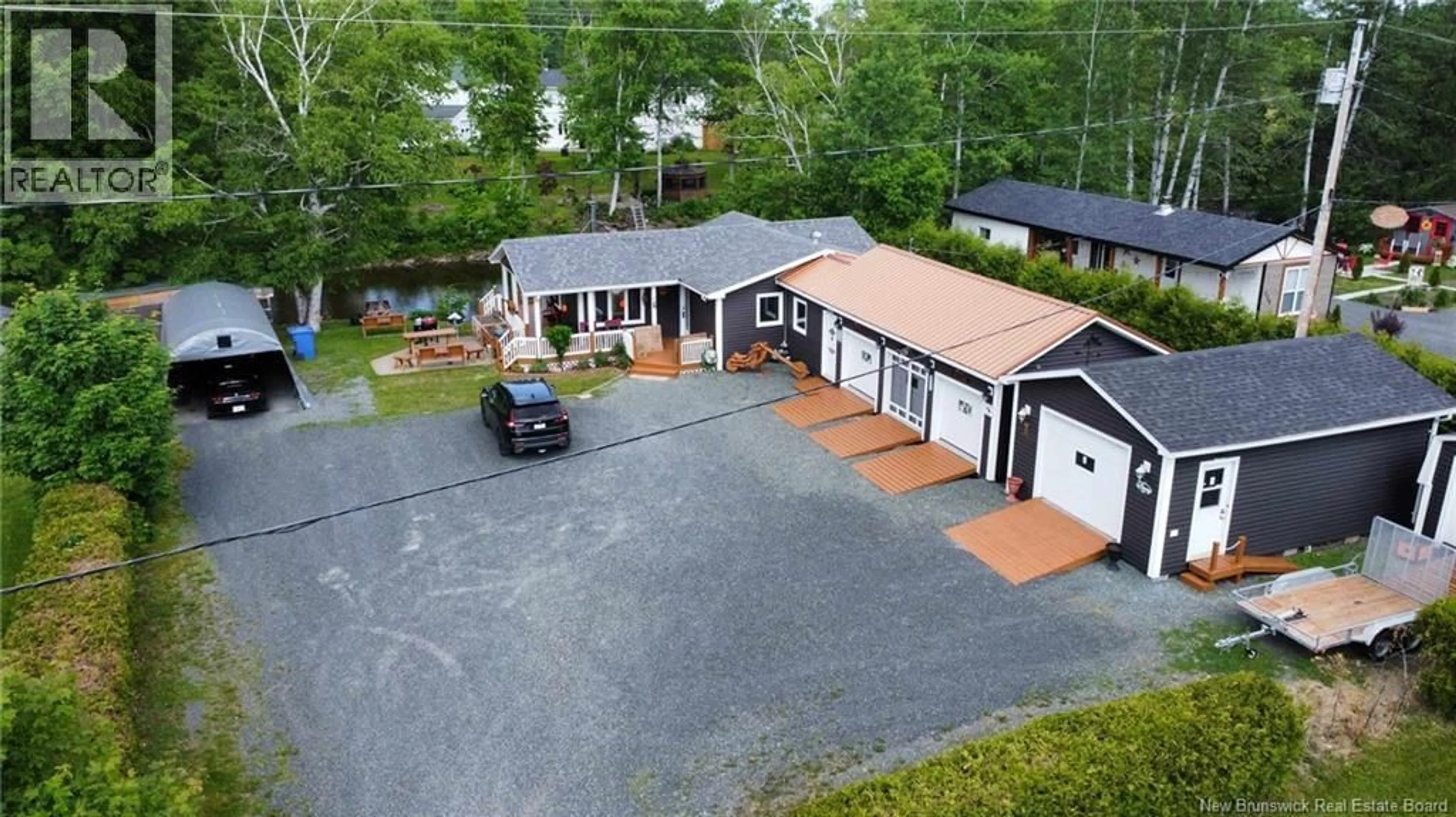 A pic from outside/outdoor area/front of a property/back of a property/a pic from drone, street for 2052 MILLSTREAM ROAD, Dunlop New Brunswick E8K2K3