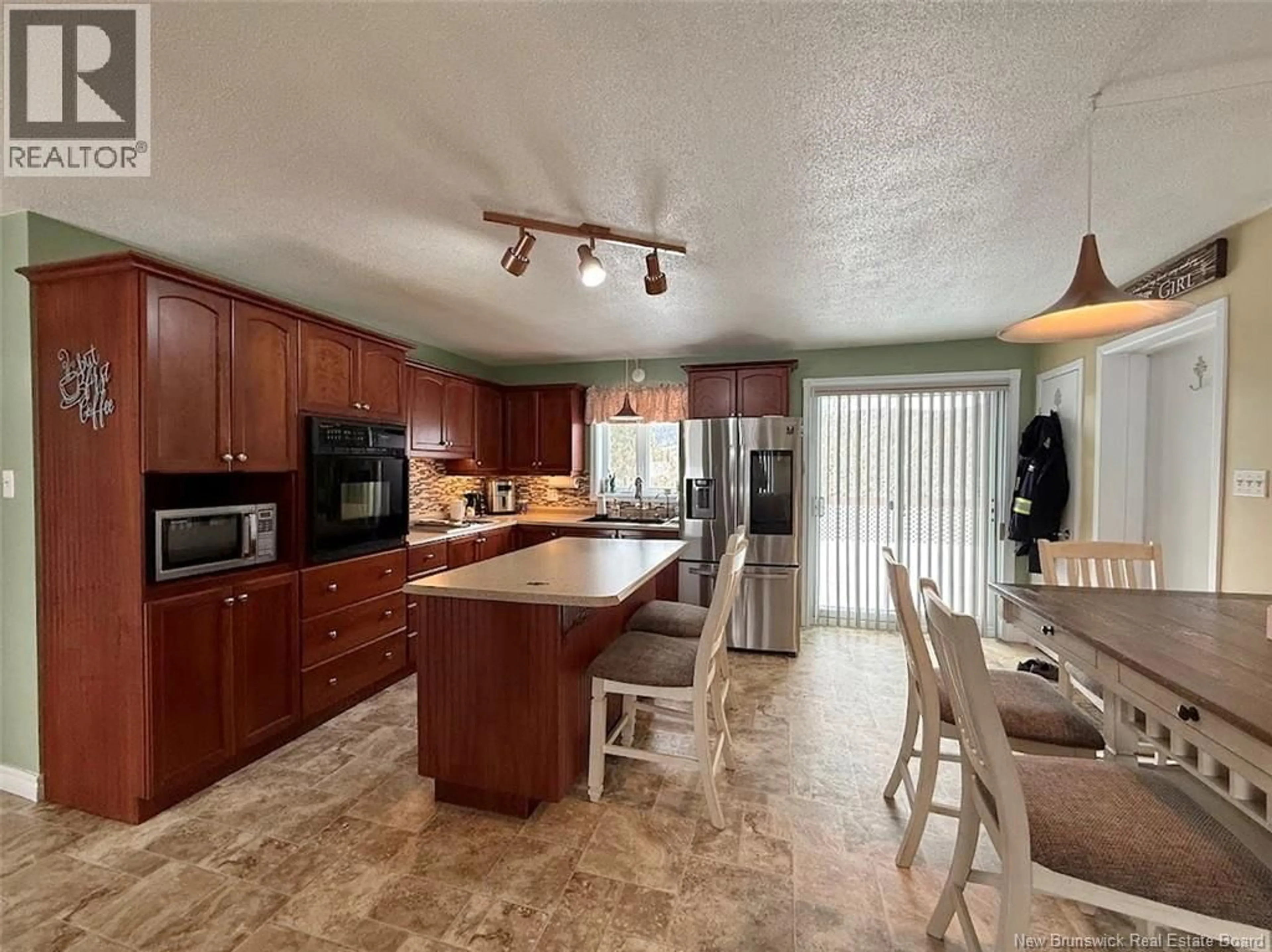 Open concept kitchen, ceramic/tile floor for 84 AQUEDUC STREET, Saint-Jacques New Brunswick E7B1R2