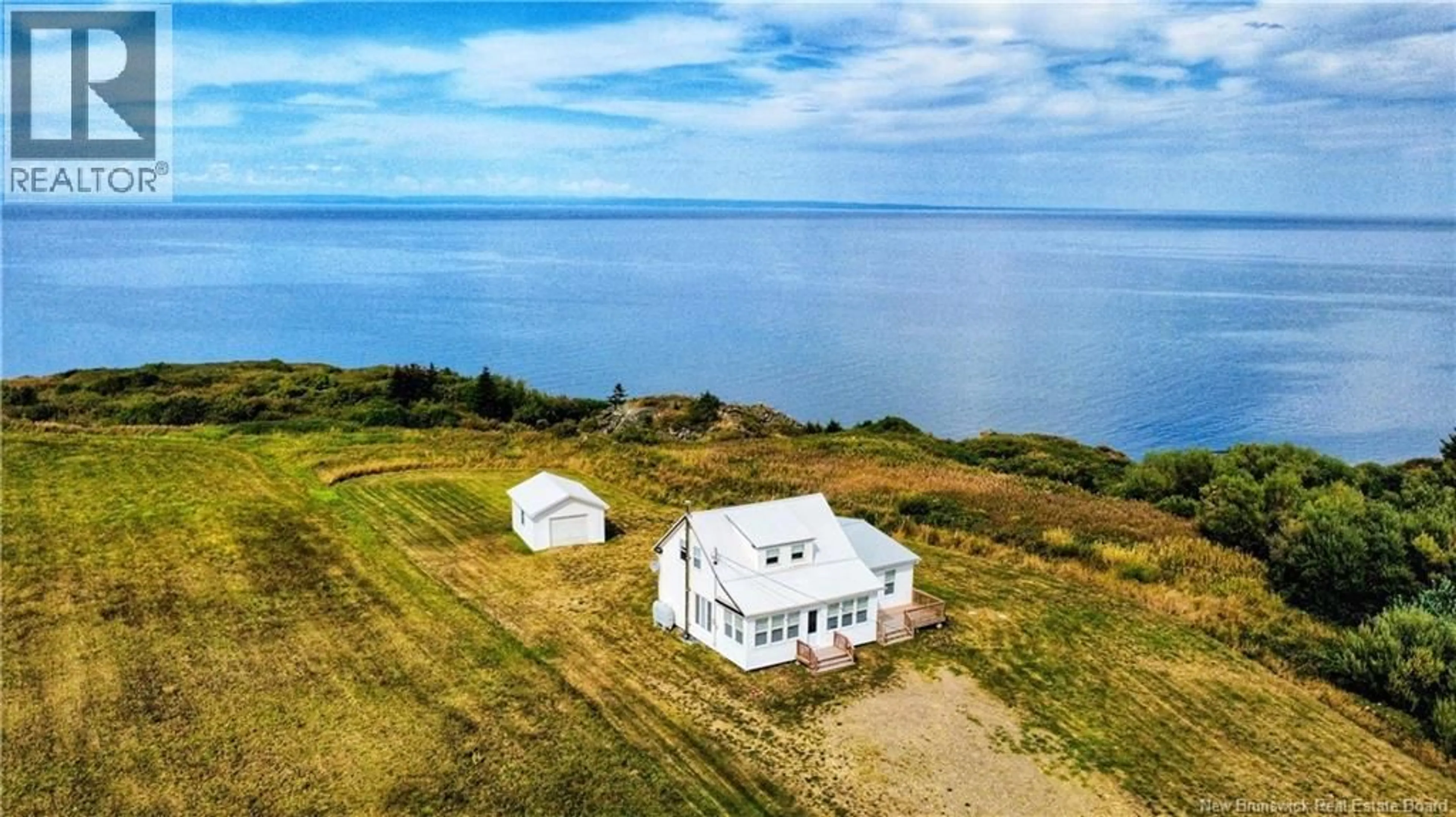 A pic from outside/outdoor area/front of a property/back of a property/a pic from drone, water/lake/river/ocean view for 8201 NB 11, New Bandon New Brunswick E2A5P7
