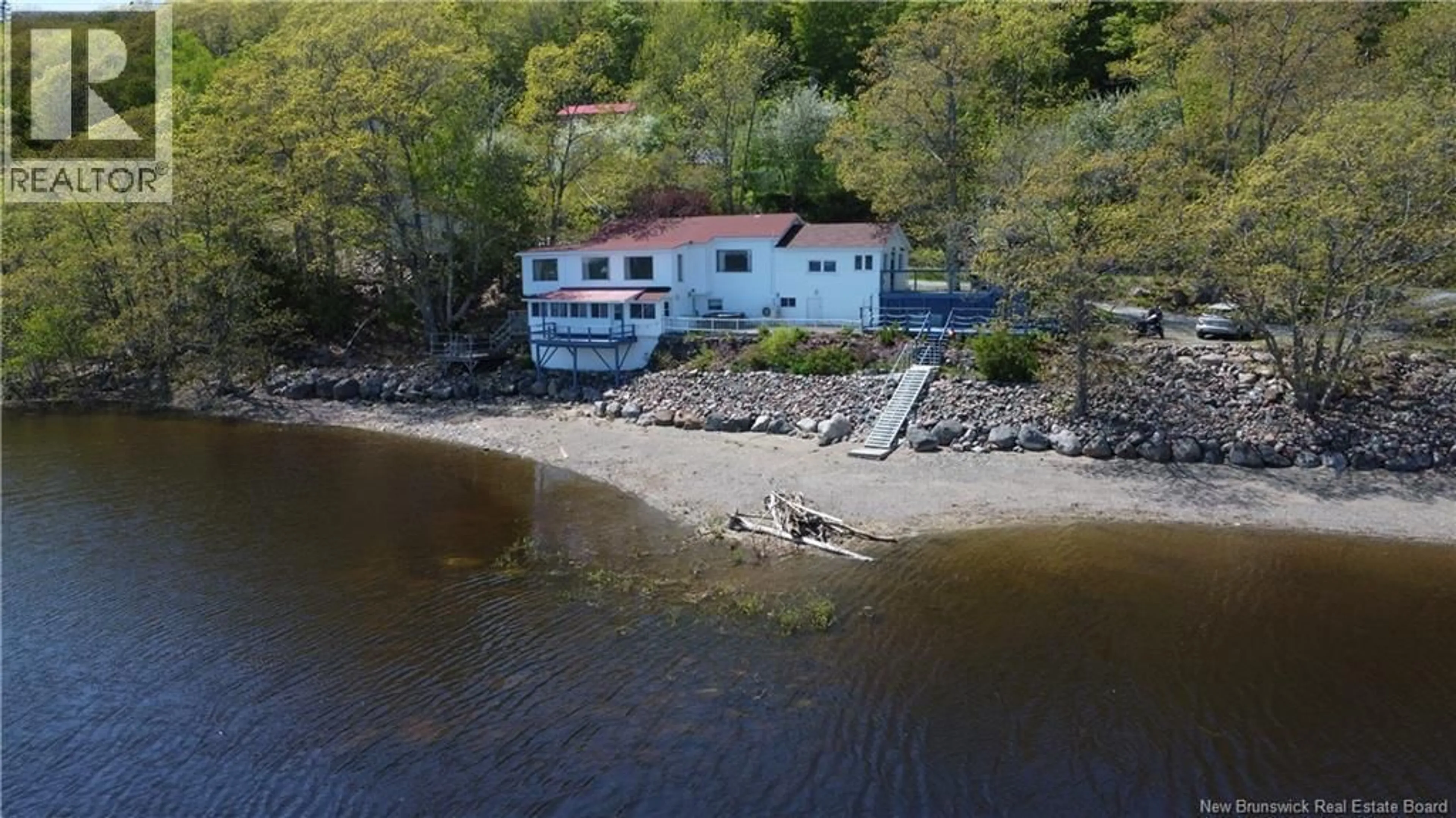 A pic from outside/outdoor area/front of a property/back of a property/a pic from drone, water/lake/river/ocean view for 6577 ROUTE 102, Oak Point New Brunswick E5M2G9