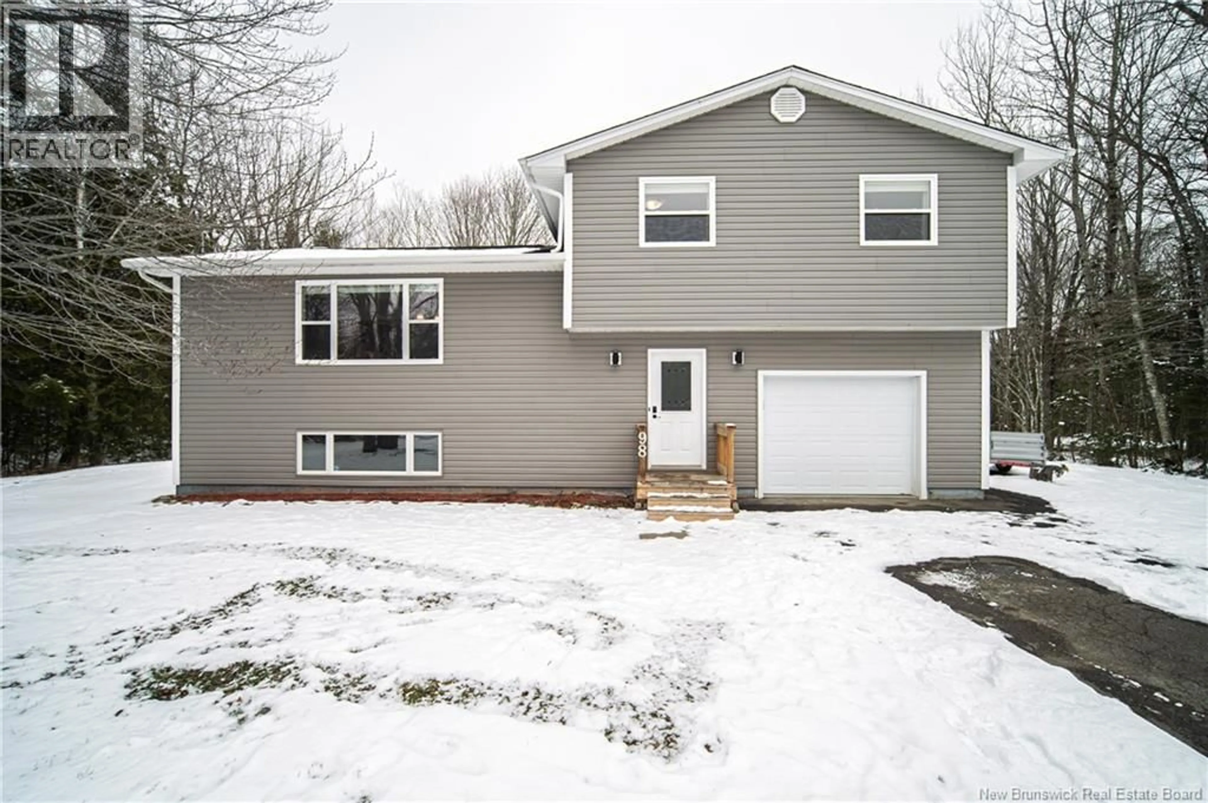 Home with vinyl exterior material, street for 98 MENZIES DRIVE, Hanwell New Brunswick E3C1M6