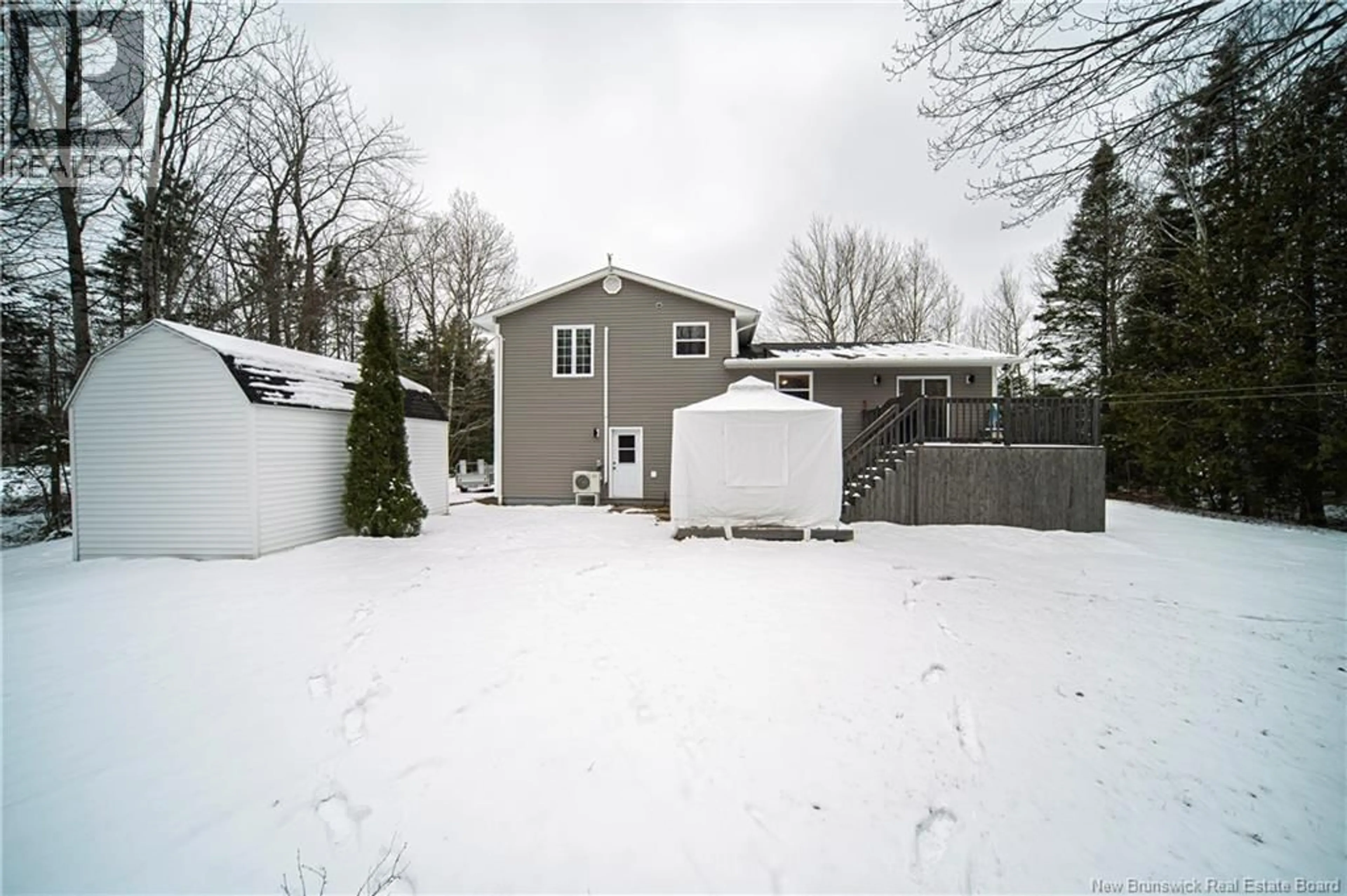 A pic from outside/outdoor area/front of a property/back of a property/a pic from drone, street for 98 MENZIES DRIVE, Hanwell New Brunswick E3C1M6