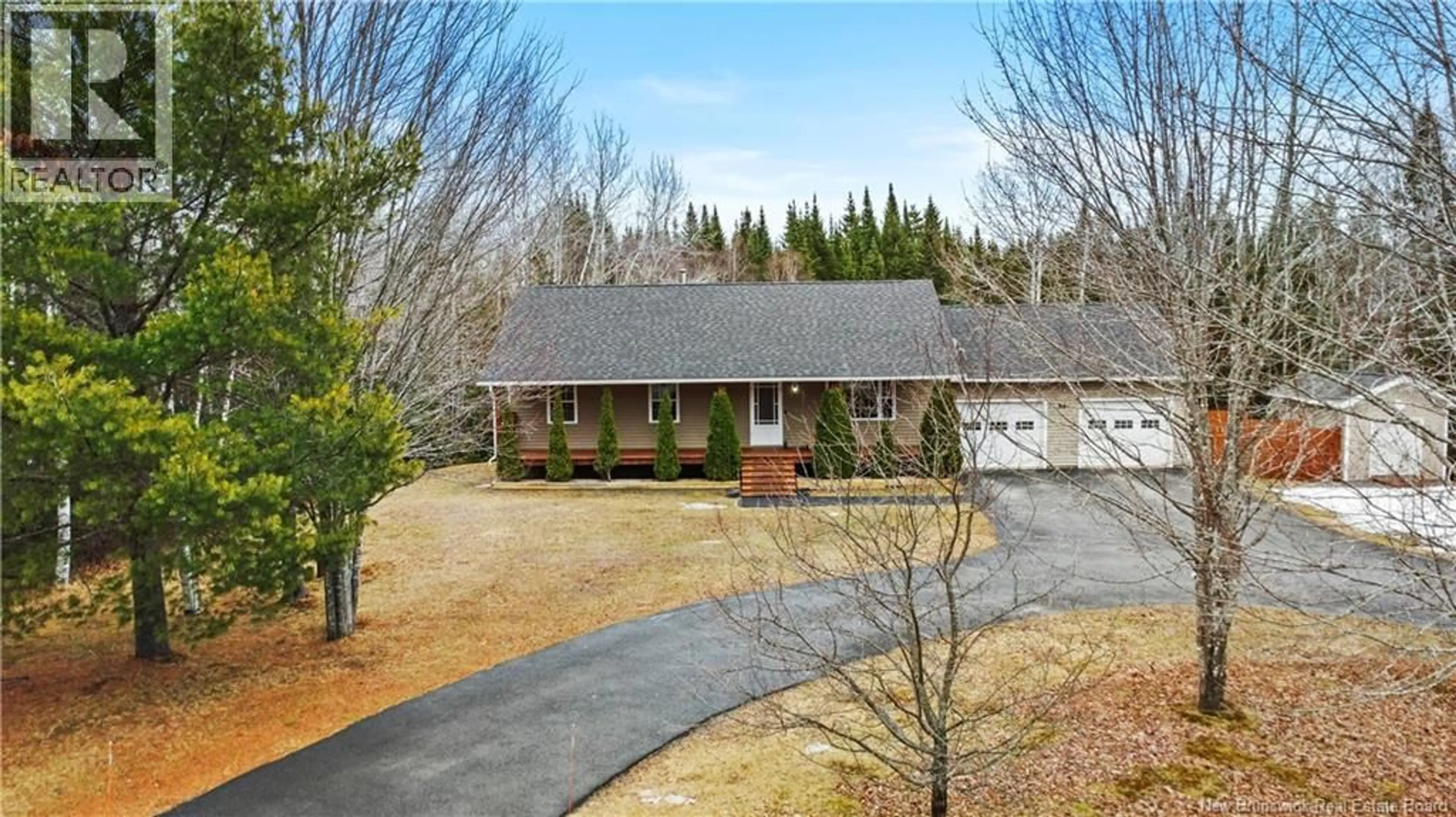 A pic from outside/outdoor area/front of a property/back of a property/a pic from drone, street for 122 SANDSTONE DRIVE, Hanwell New Brunswick E3E0B9