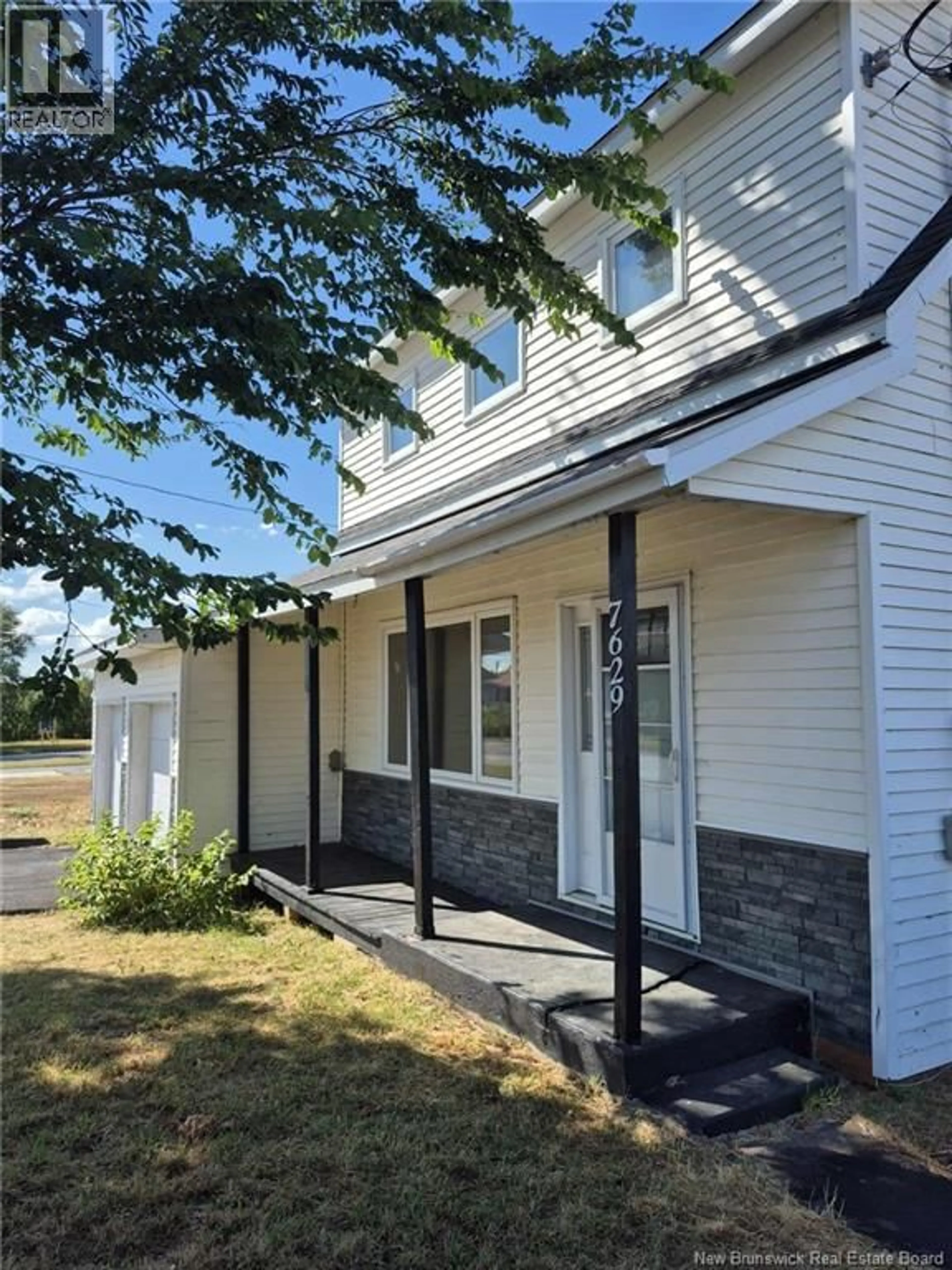 Home with vinyl exterior material, street for 7629 ST PAUL, Bas-Caraquet New Brunswick E1W6B9