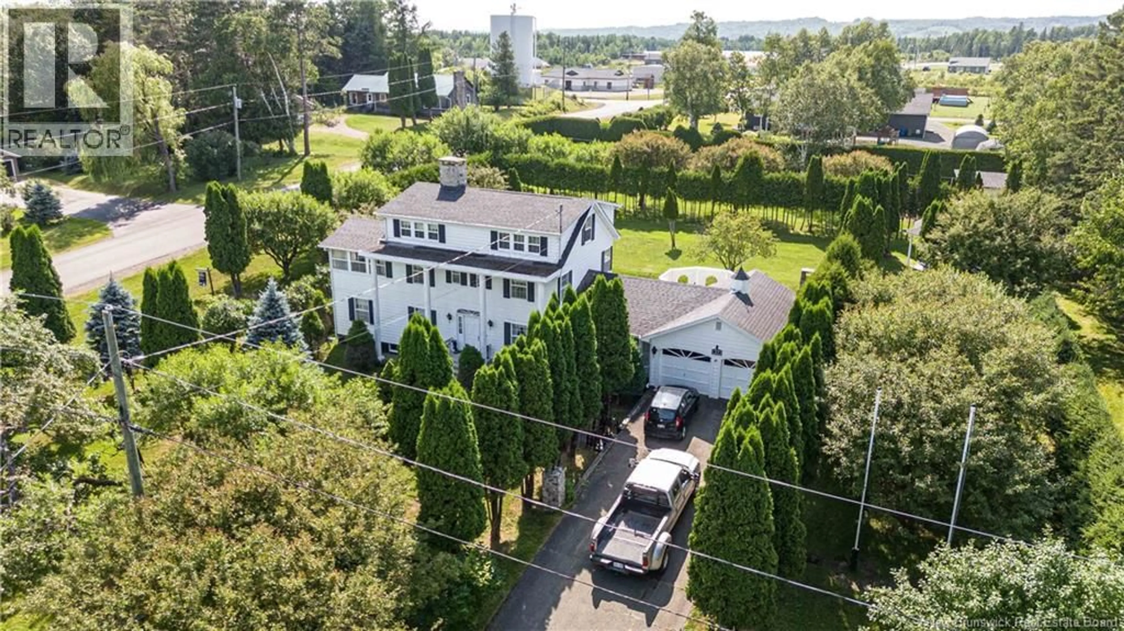 A pic from outside/outdoor area/front of a property/back of a property/a pic from drone, street for 55 HILLCREST STREET, Plaster Rock New Brunswick E7G1V2