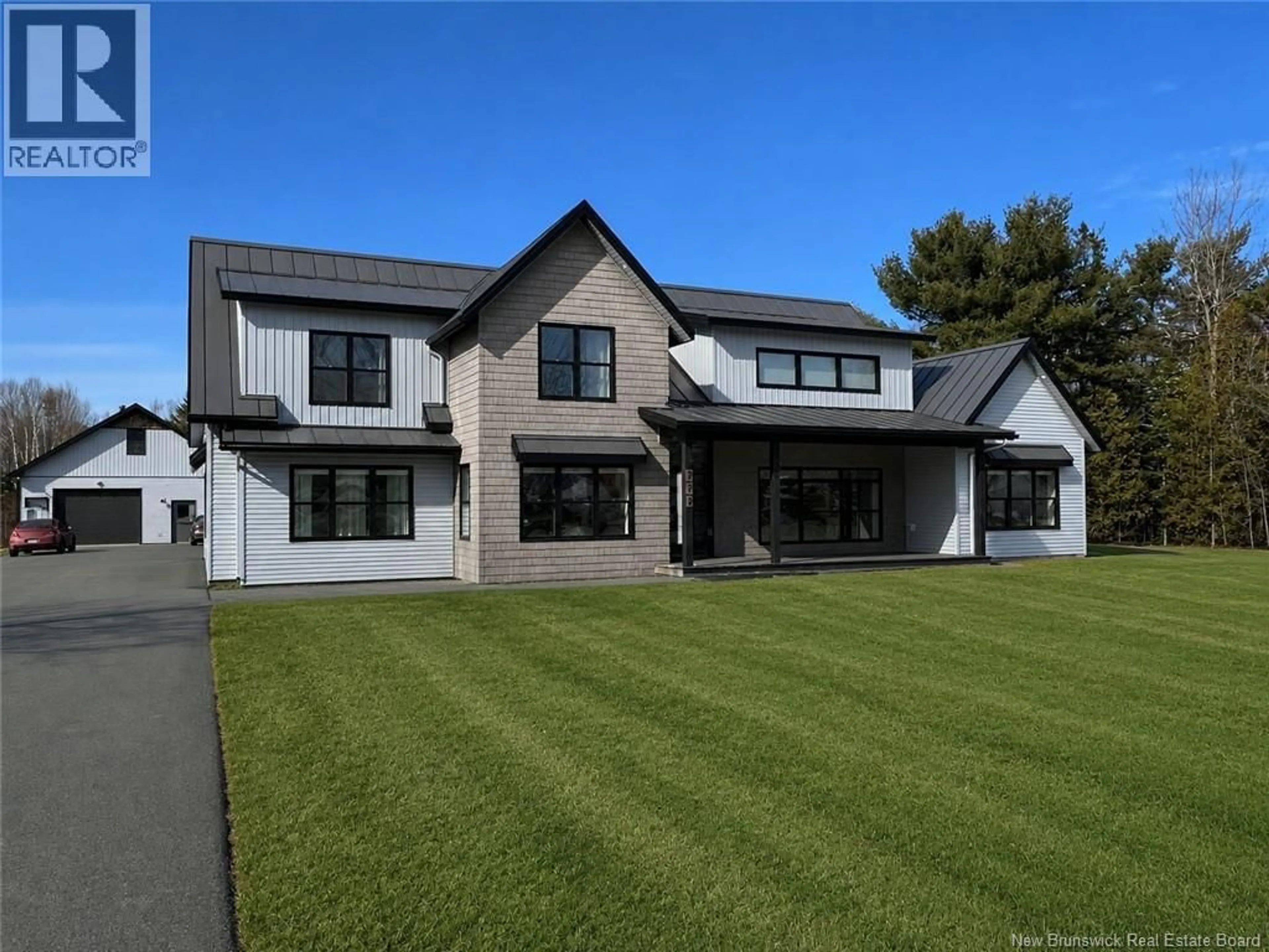 Home with vinyl exterior material, street for 777 RUE RIVIÈRE A LA TRUITE, Tracadie New Brunswick E1X2M4