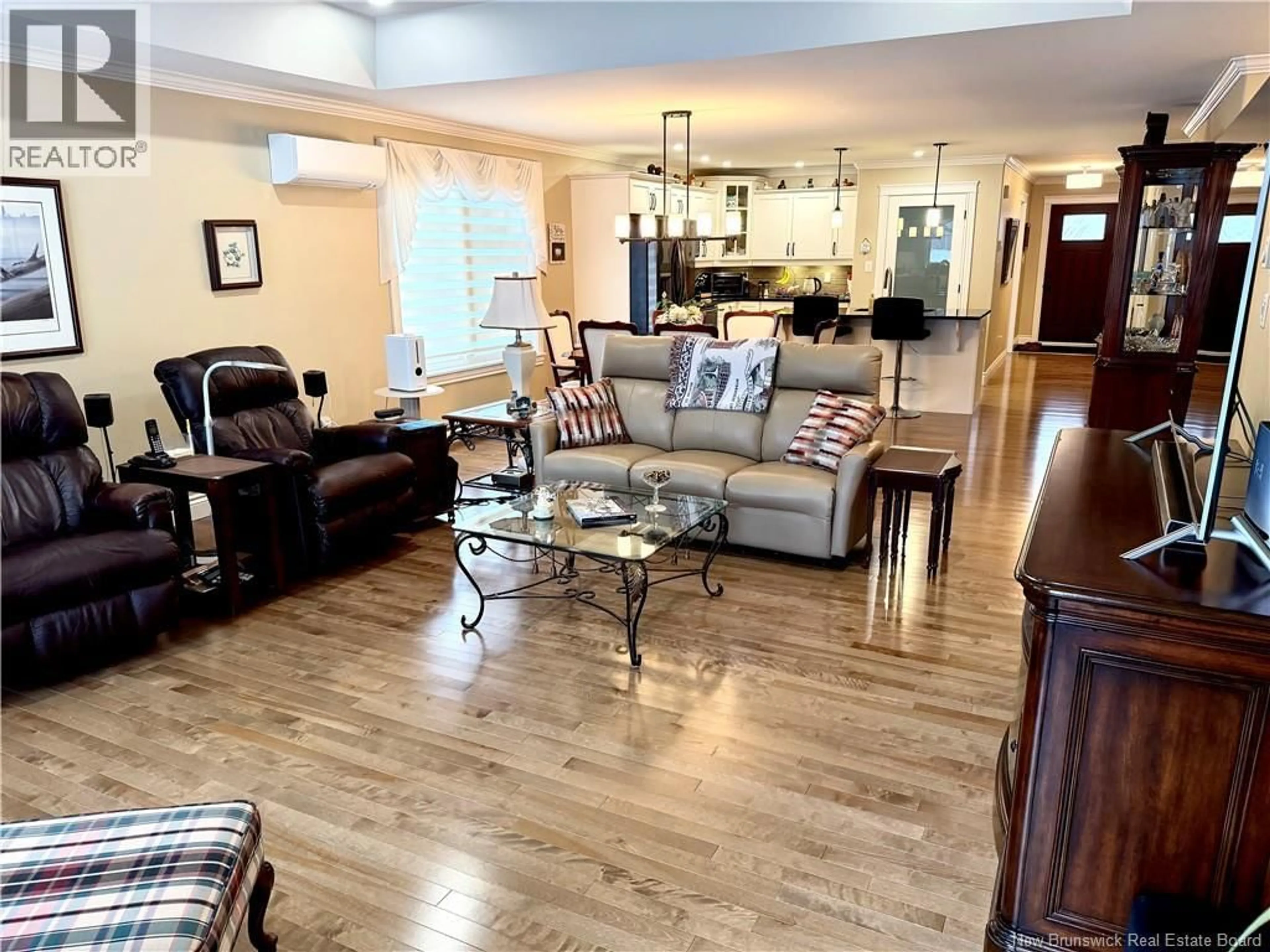 Living room with furniture, wood/laminate floor for 71 BEL-AIRE AVENUE, Rothesay New Brunswick E2E4Y1