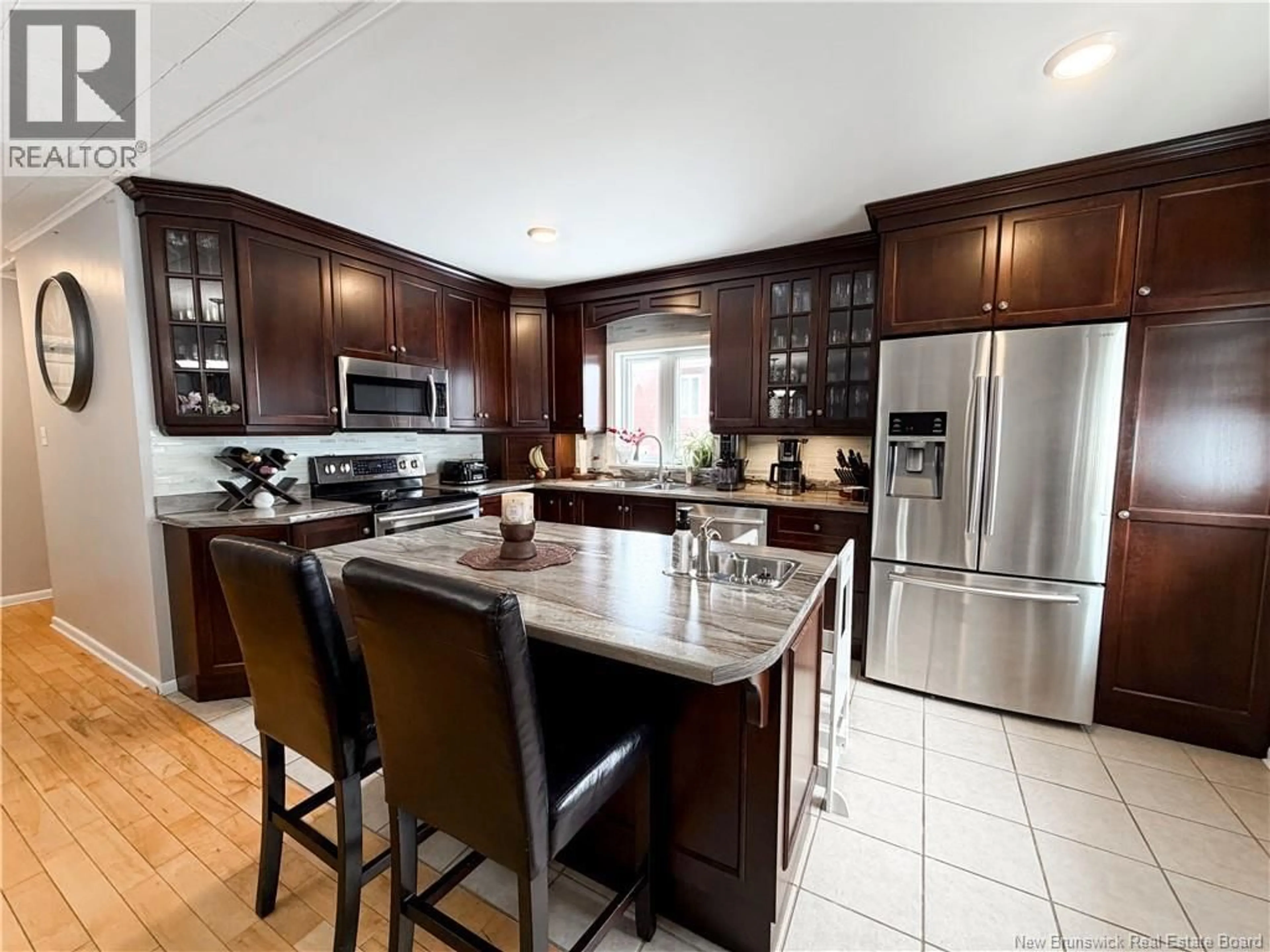 Open concept kitchen, ceramic/tile floor for 9 STANLEY STREET, Campbellton New Brunswick E3N1G7