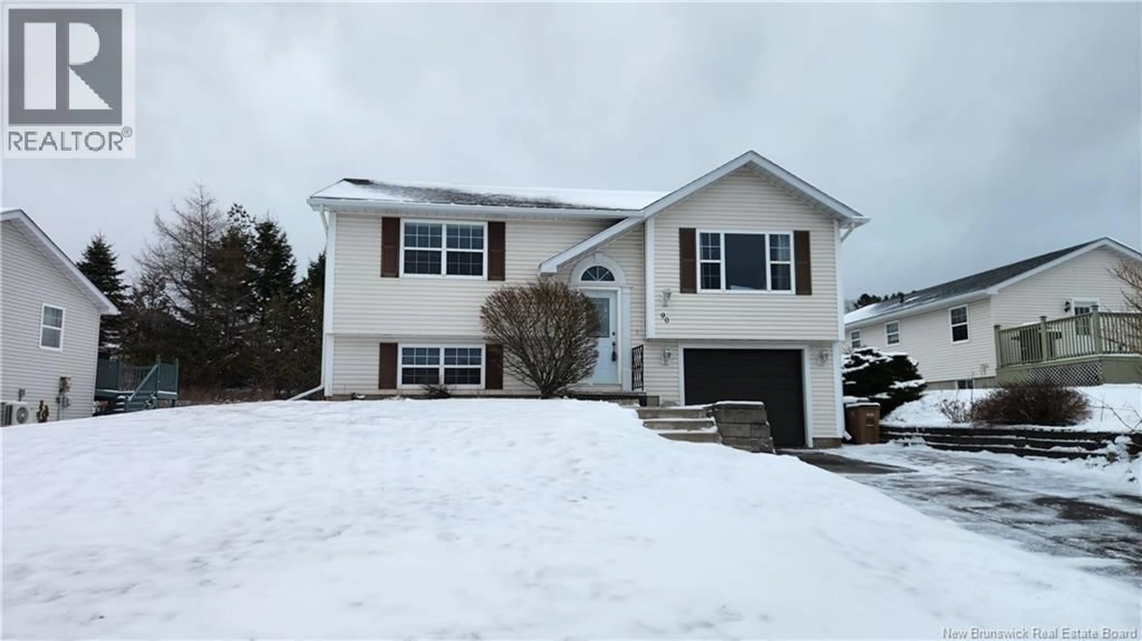 Home with vinyl exterior material, street for 90 HONEYSUCKLE DRIVE, Saint John New Brunswick E2M5T1