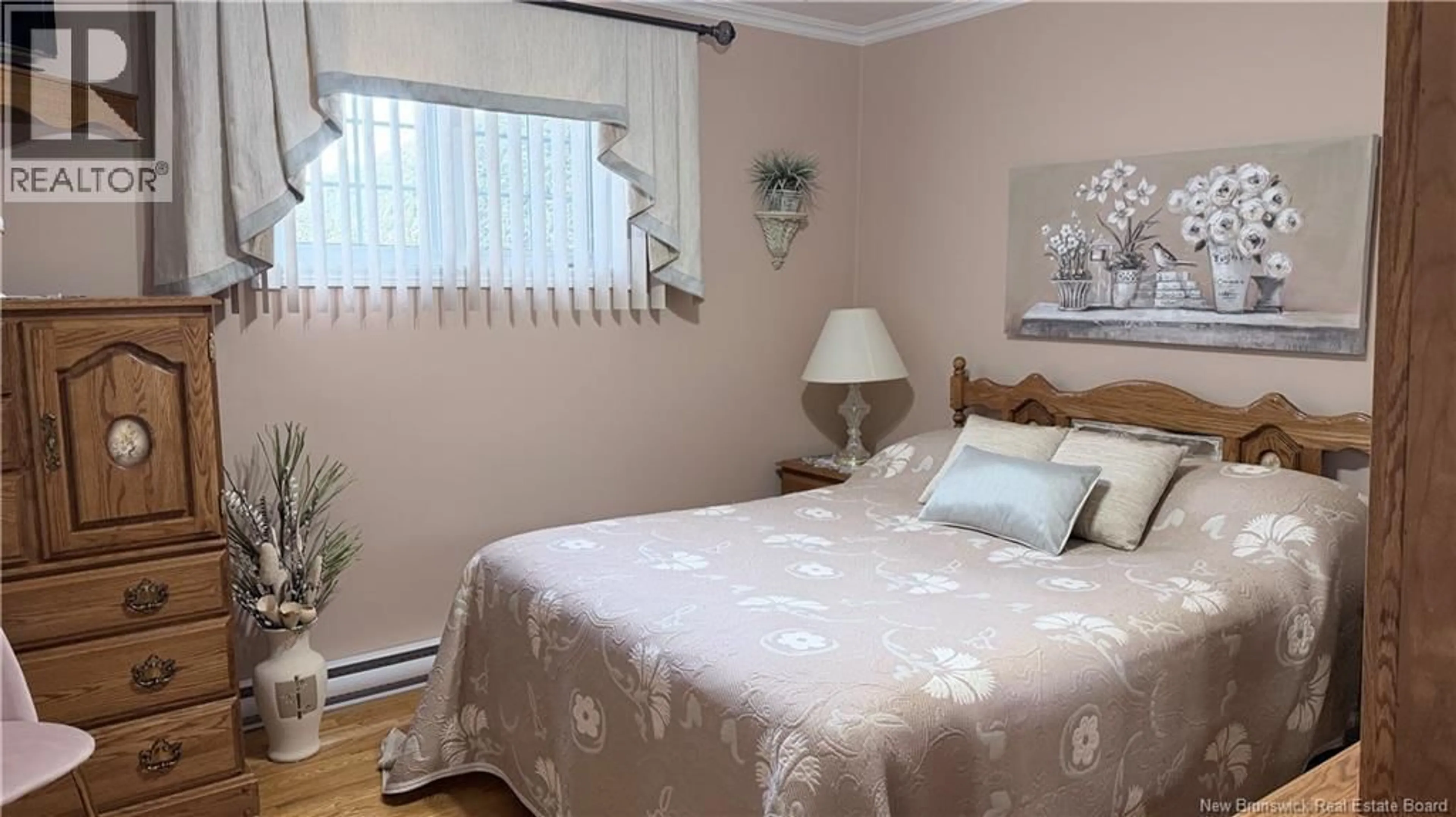 Bedroom with bed, wood/laminate floor for 9 RUE SAINT JOSEPH, Sainte-Anne-De-Madawaska New Brunswick E7E1K6