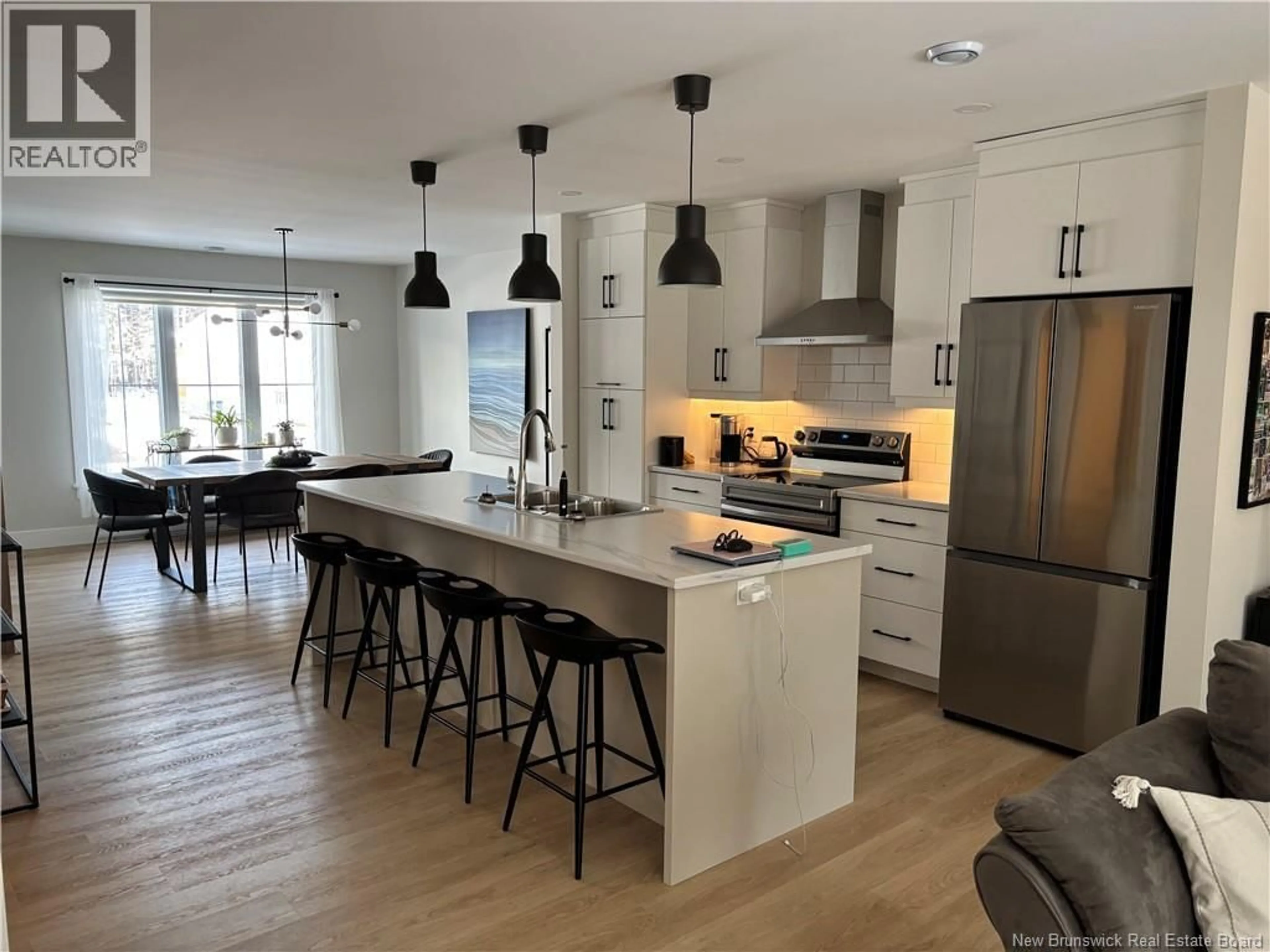 Open concept kitchen, wood/laminate floor for 150 ELSLIGER STREET, Dieppe New Brunswick E1K0A5
